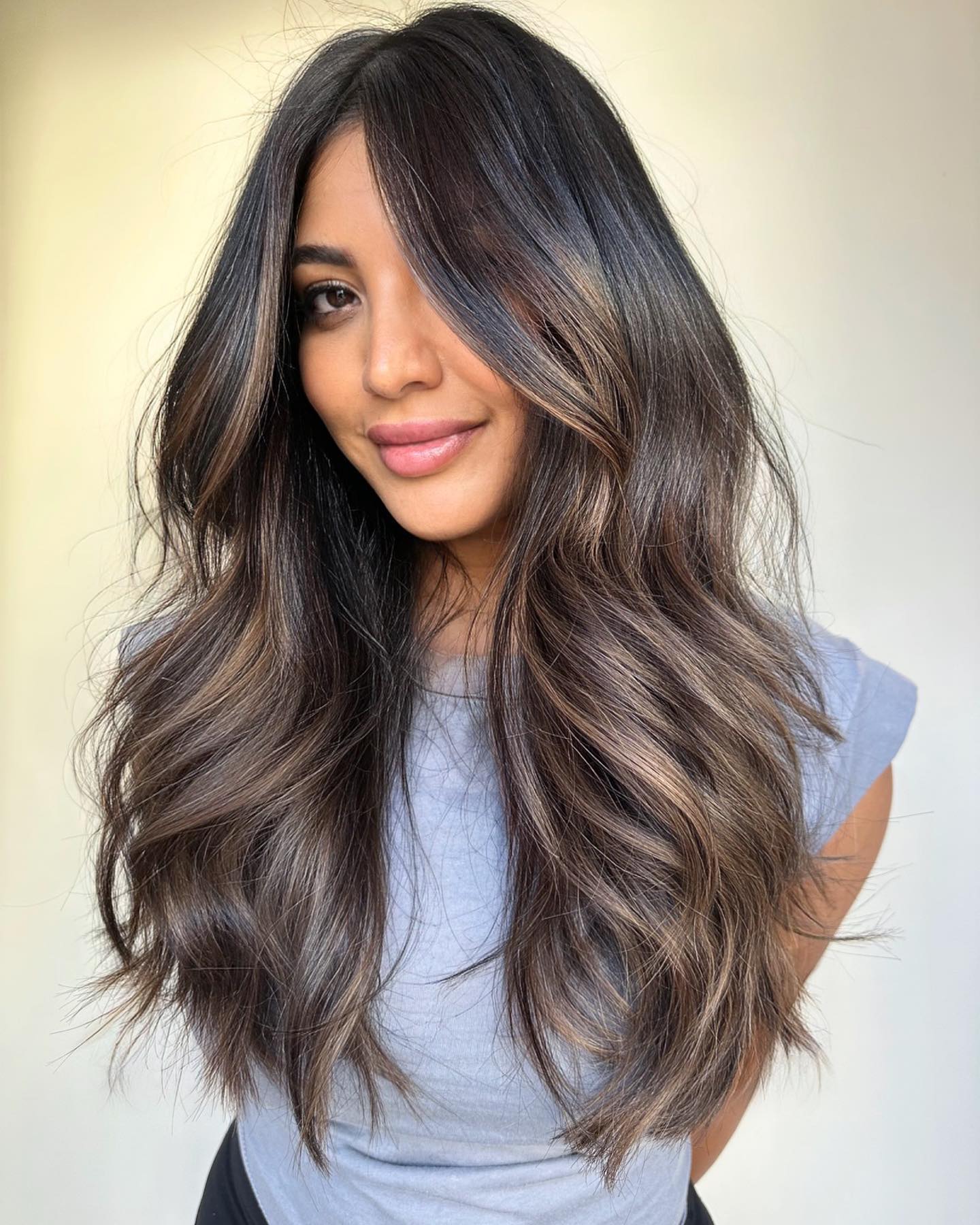 Voluminous Ashy Brown Balayage with Soft, Defined Waves