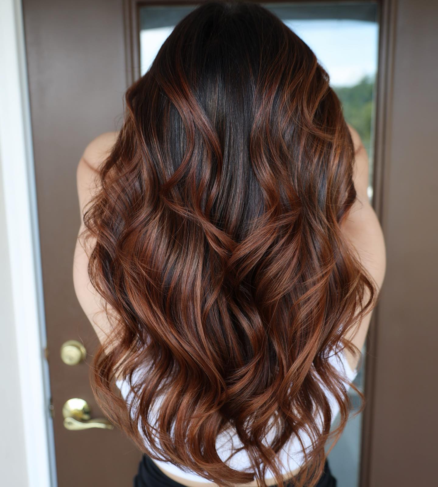 gorgeous dark caramel balayage with soft waves
