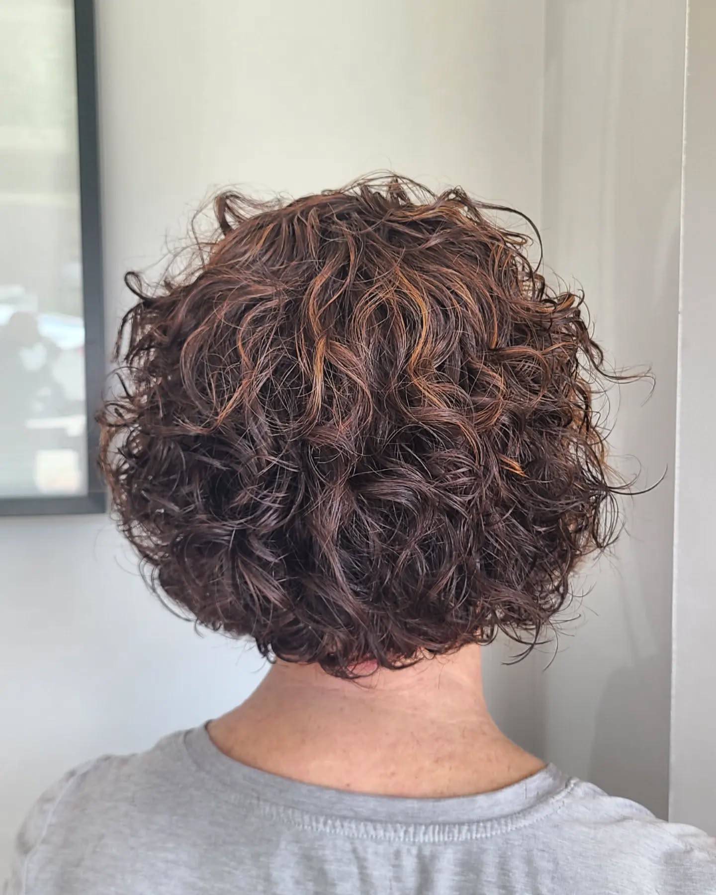 Charming Short Curly Cut with Defined Texture