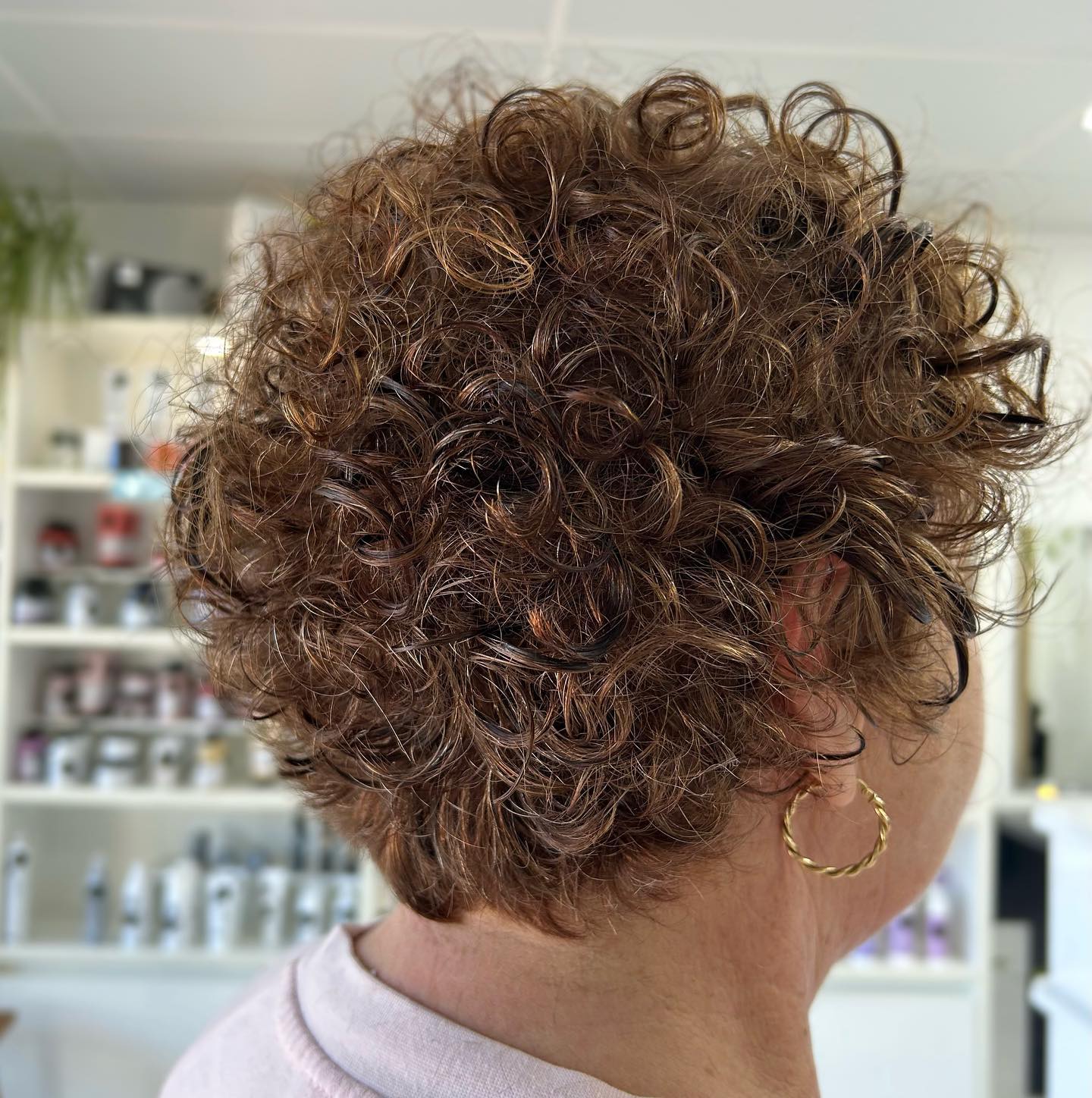 Textured Short Curly Cut with Defined Bounce