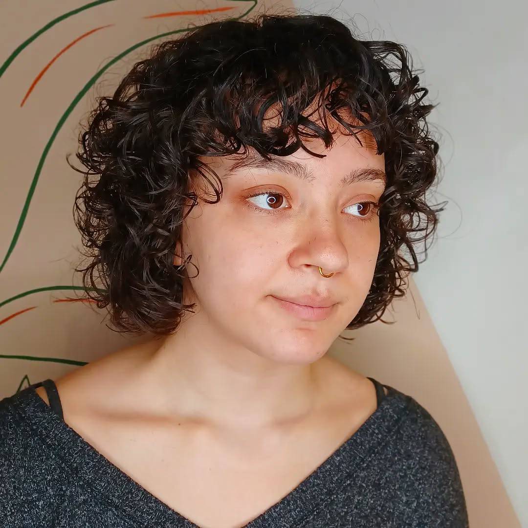 Textured Short Curly Cut with Soft Bangs