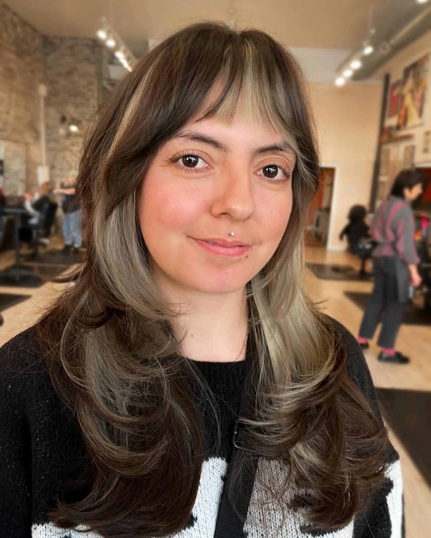 Stylish Long Layers with Face-Framing Bangs