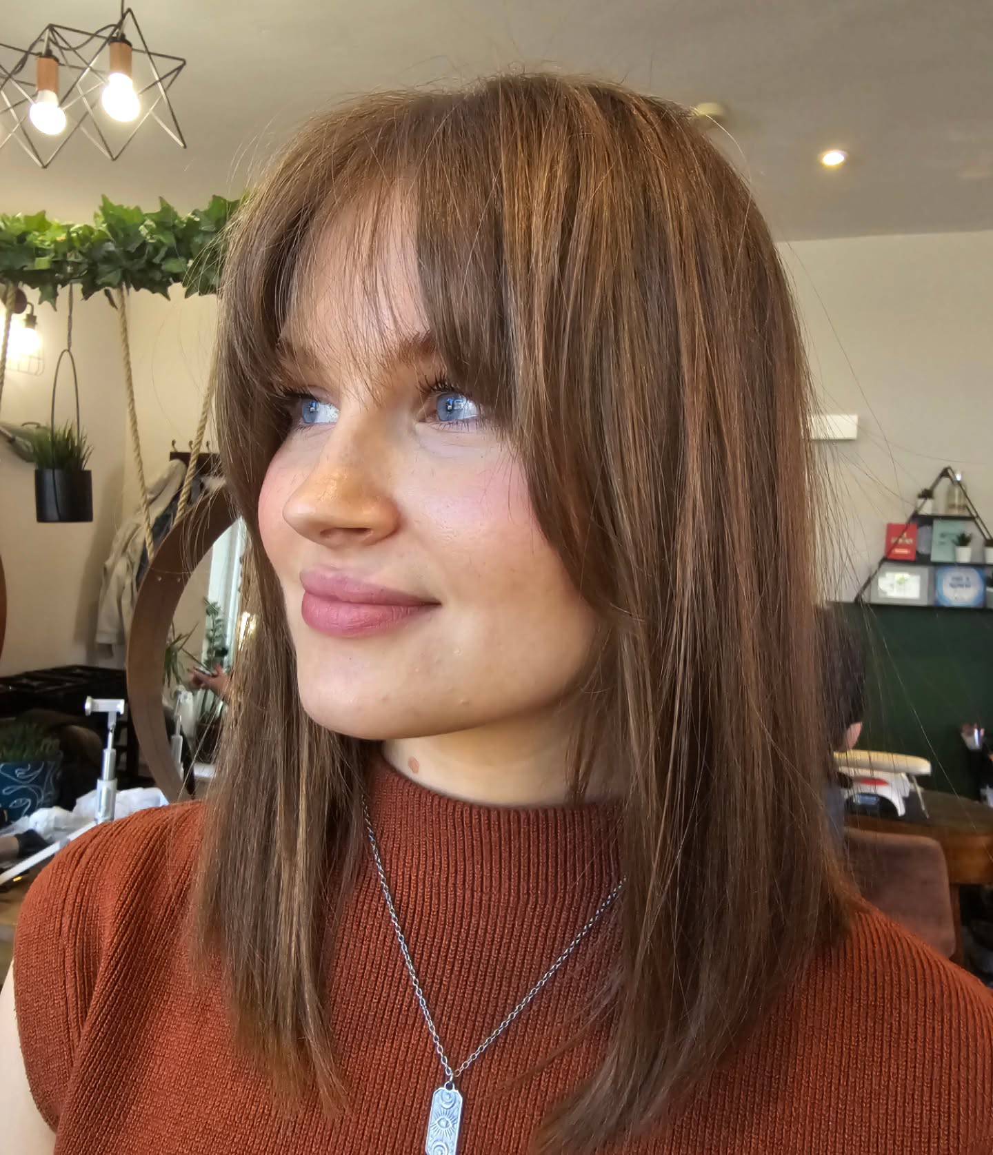Chic Layered Cut with Wispy Bangs