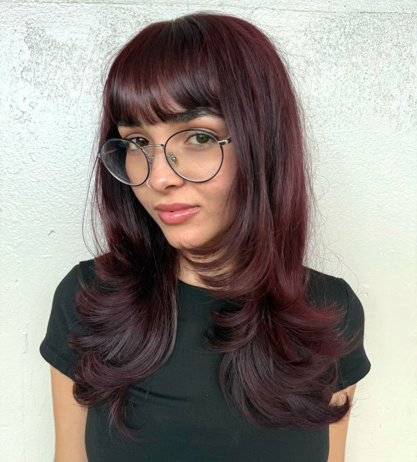 Elegant Layered Cut with Side-Swept Bangs