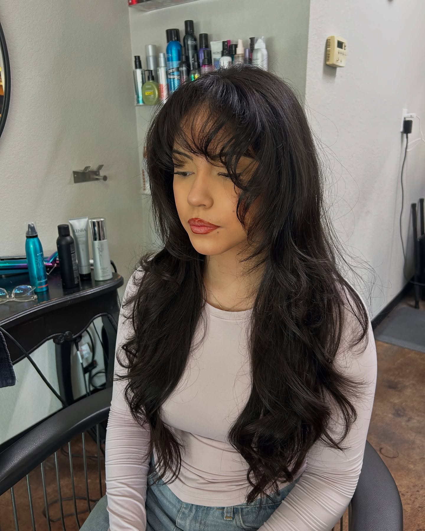 Long Layered Cut with Flirty Bangs