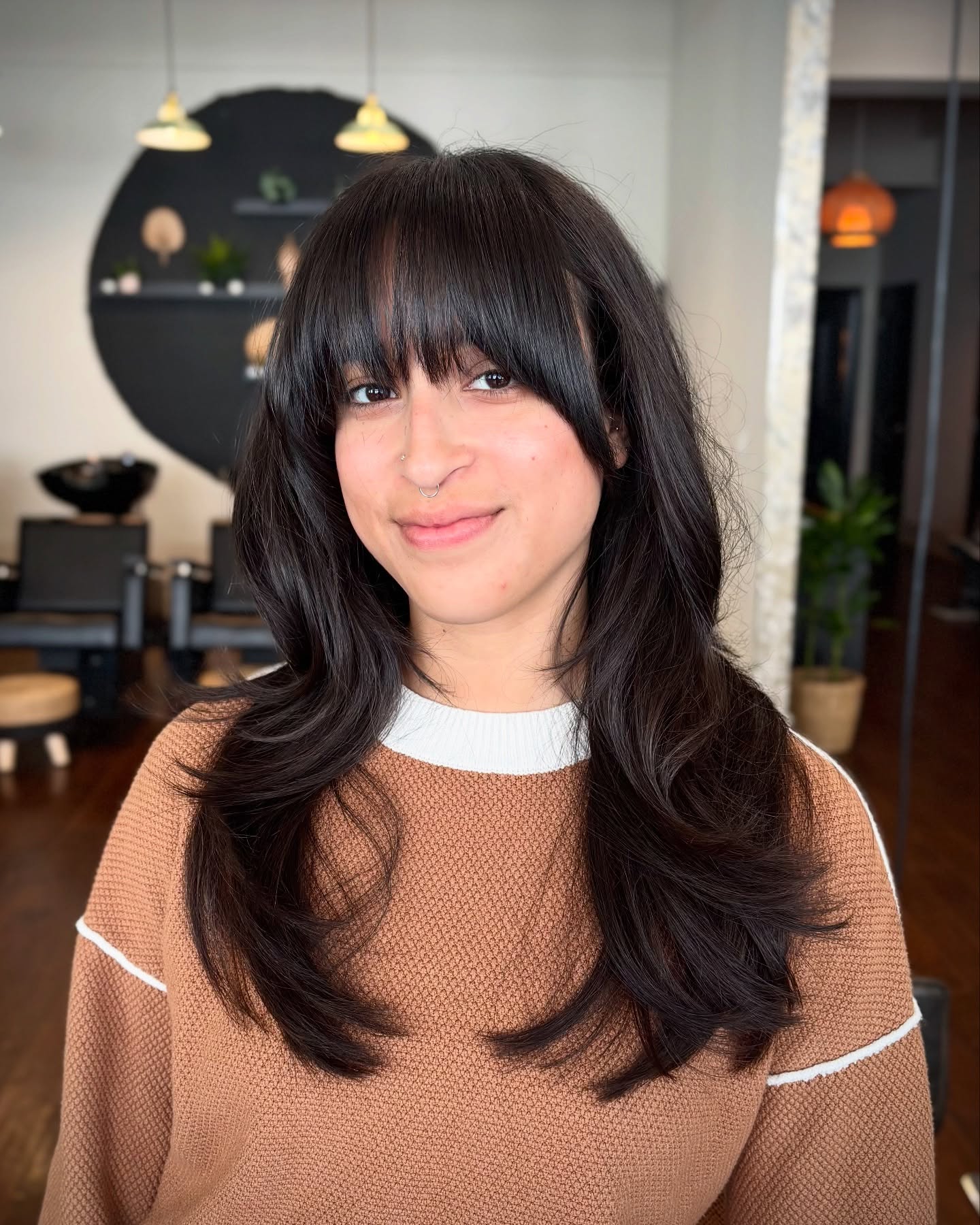 Stylish Long Layers with Bold Bangs