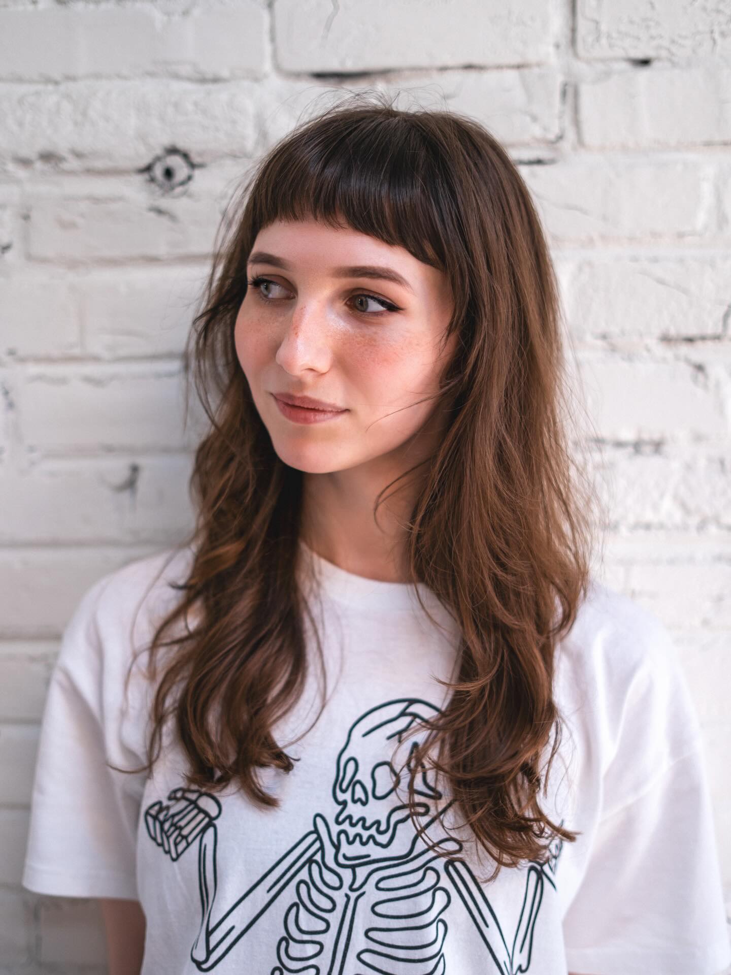 Textured Long Layers with Blunt Bangs