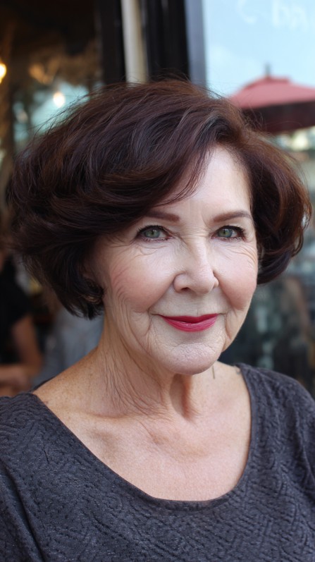 Lustrous Chestnut Rounded Bob with Voluminous Texture