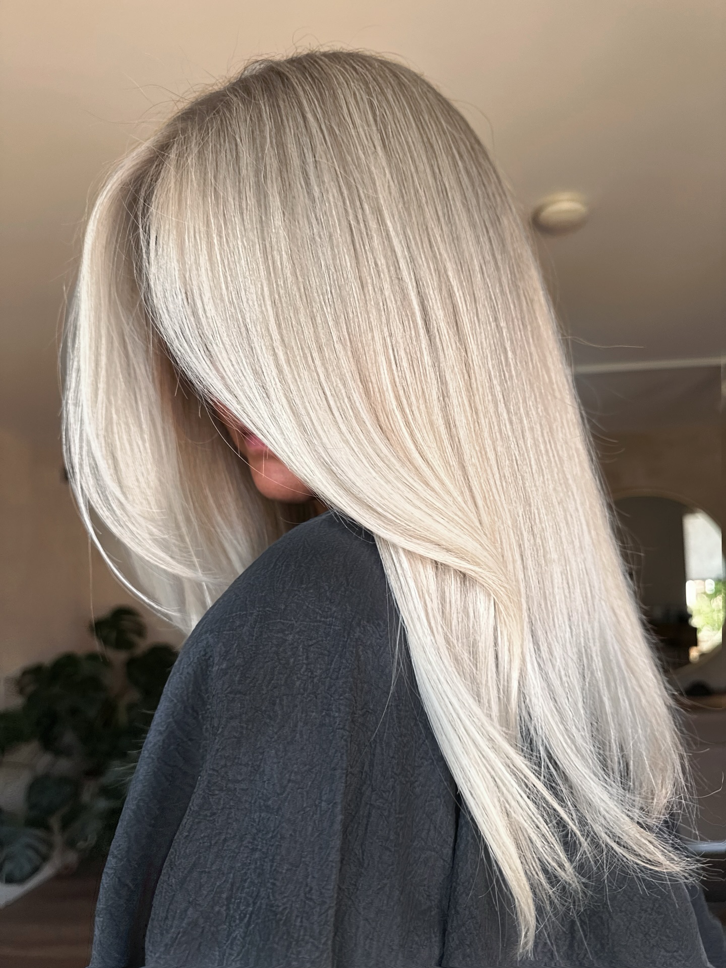 Angled Silky Blonde Bob with Subtle Shadow