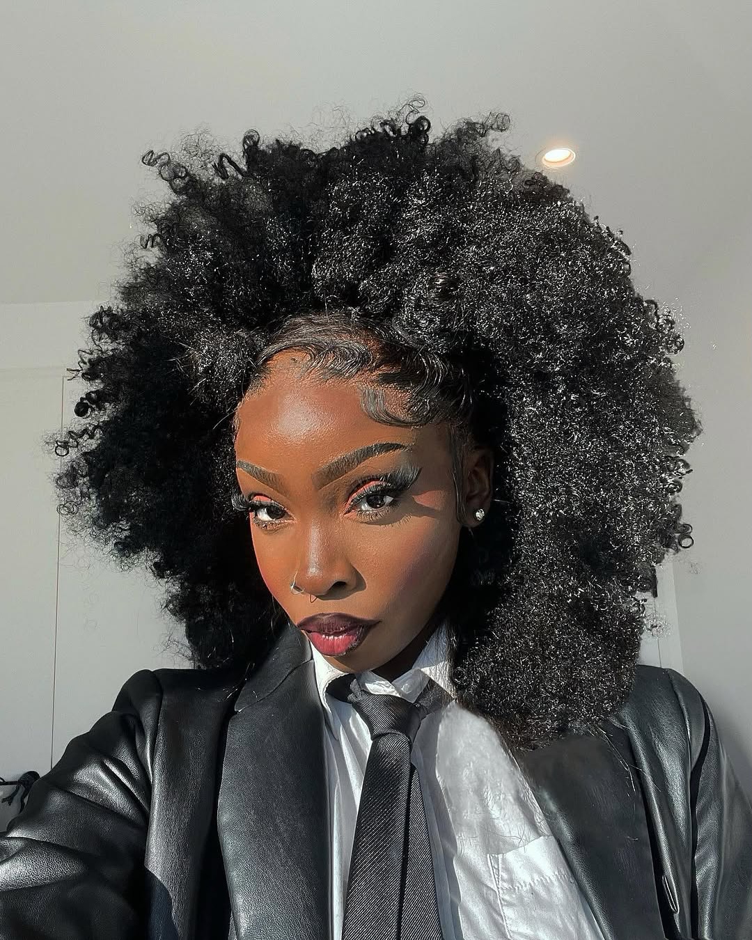 Bold High-Volume Curly Updo