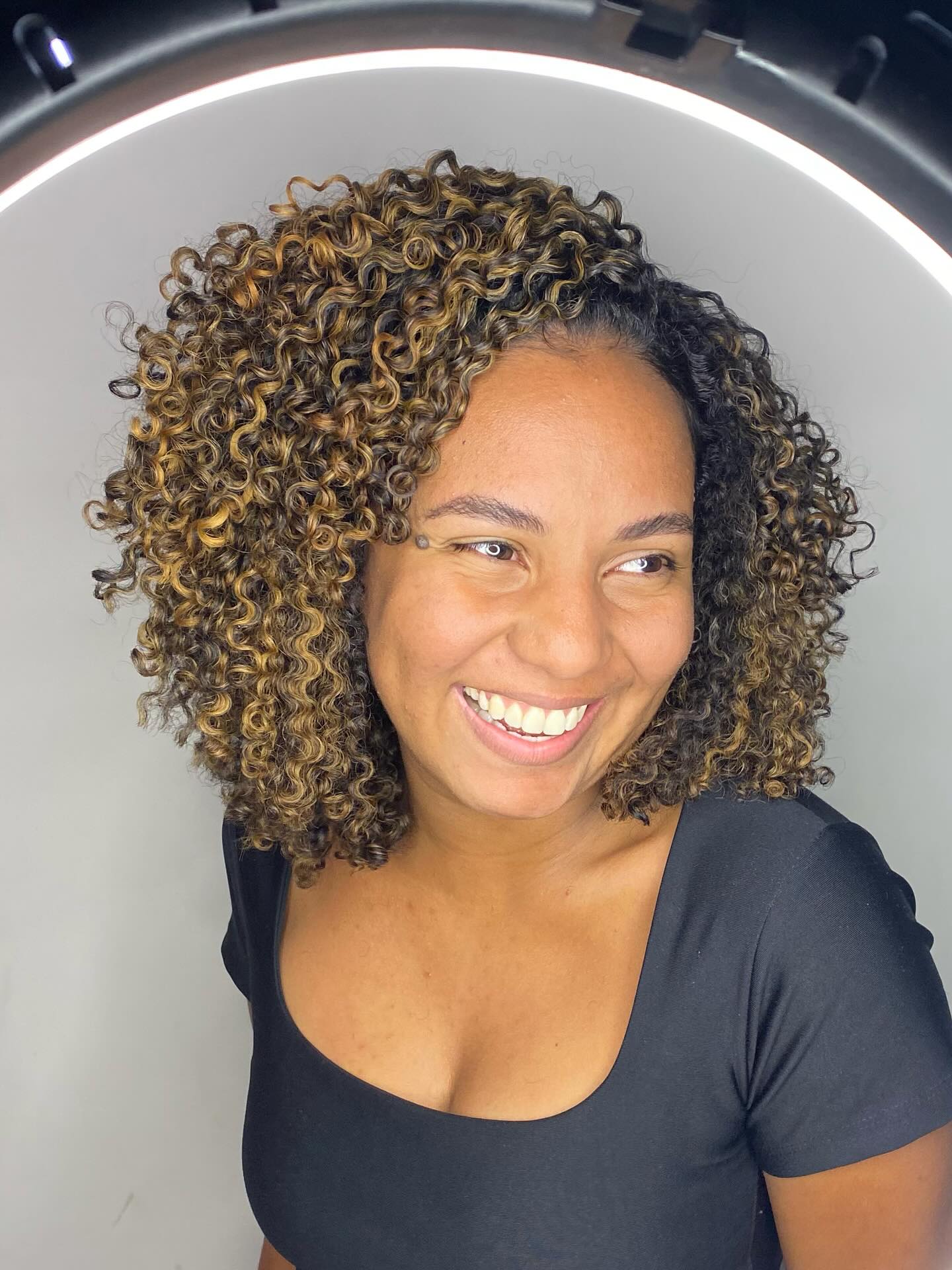 Caramel-Kissed Voluminous Spiral Curls