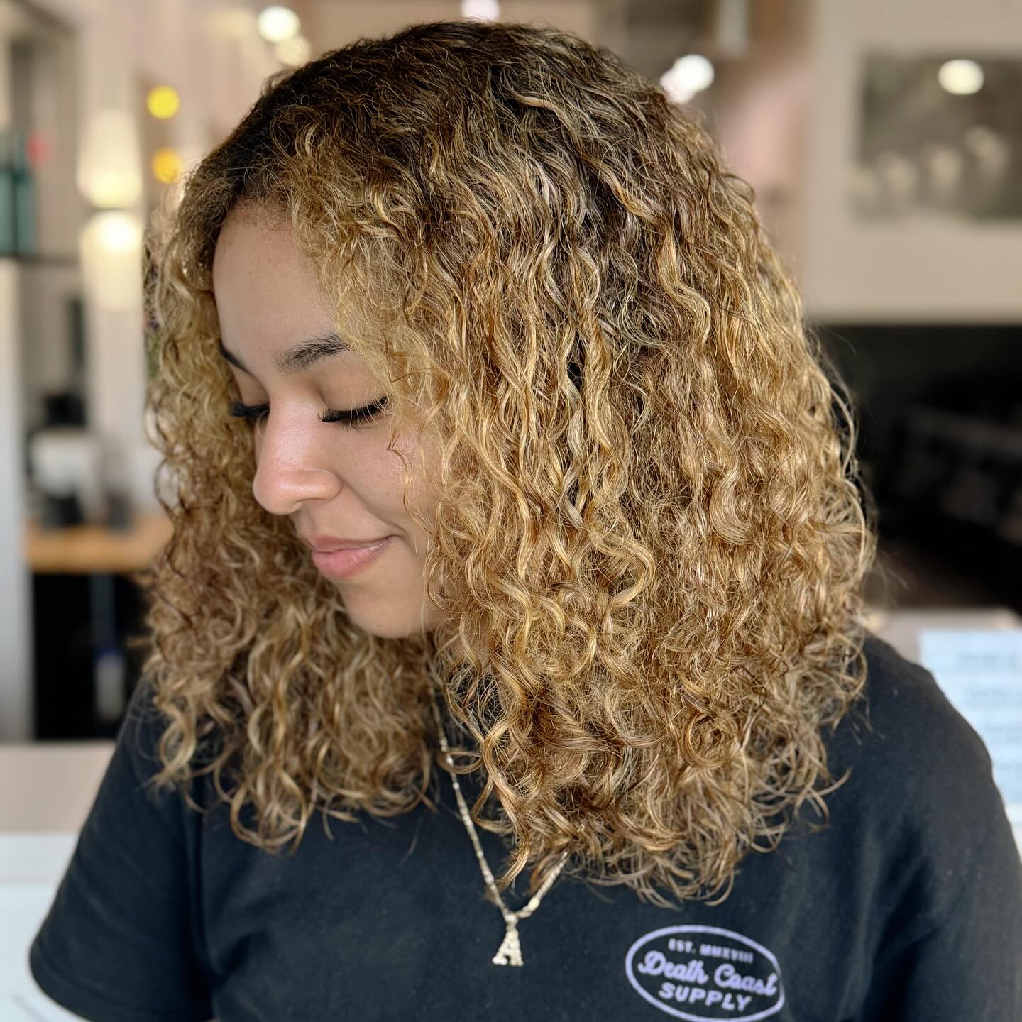 Cascading Golden Spiral Curls with a Hint of Depth