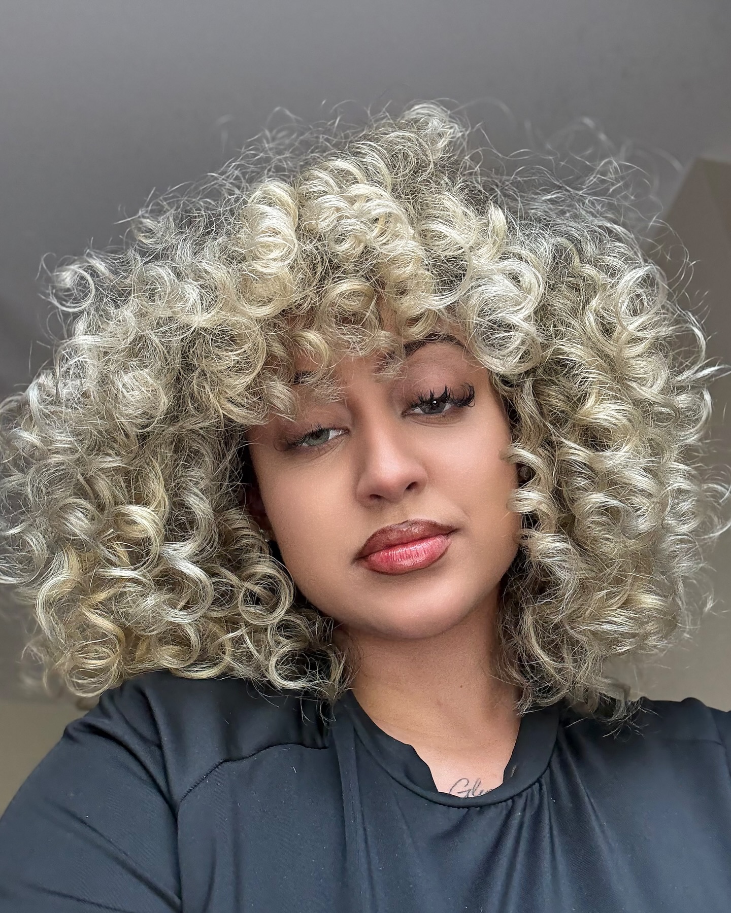 Chic Silver Blonde Bob with Defined Curls