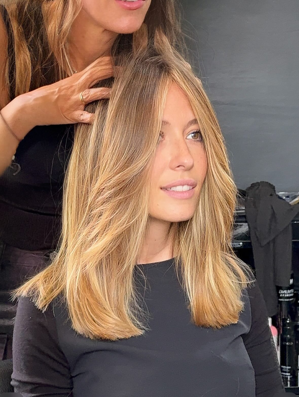 Effervescent Blonde Layered Cut with Subtle Shadow Roots