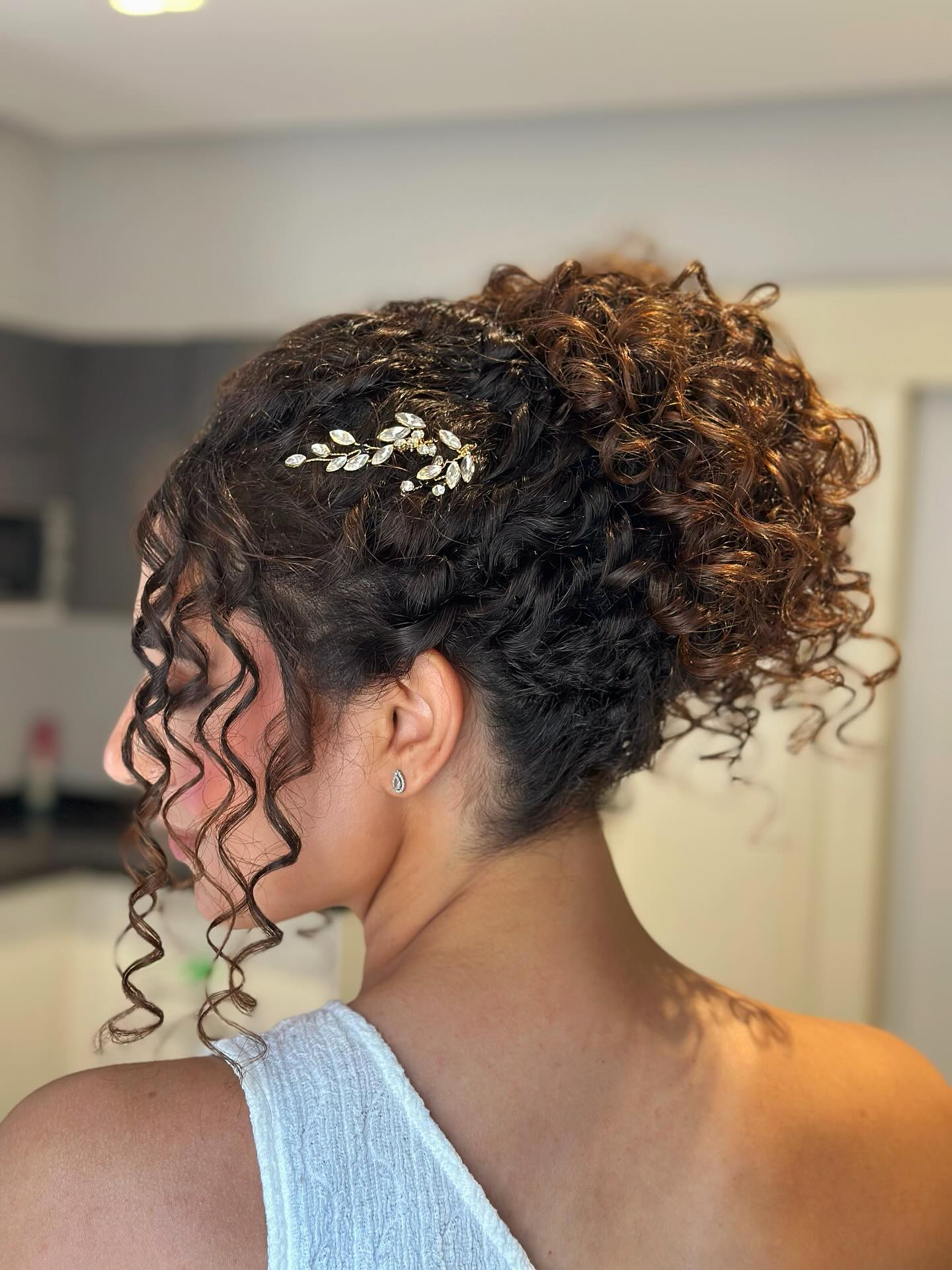 Elegant Twisted Updo with Golden Leaf Accents