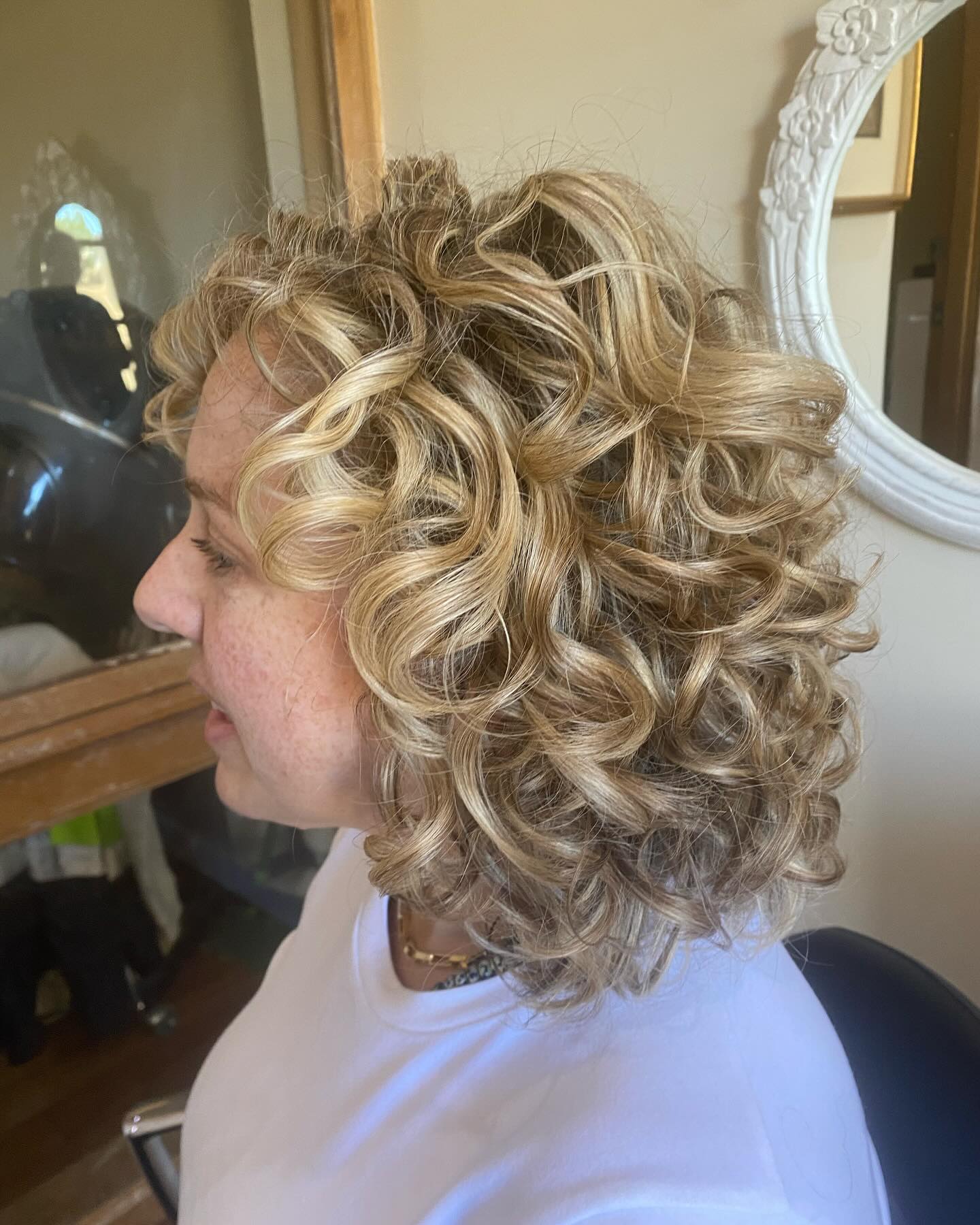 Luminous Blonde Barrel Curls with Lush Volume