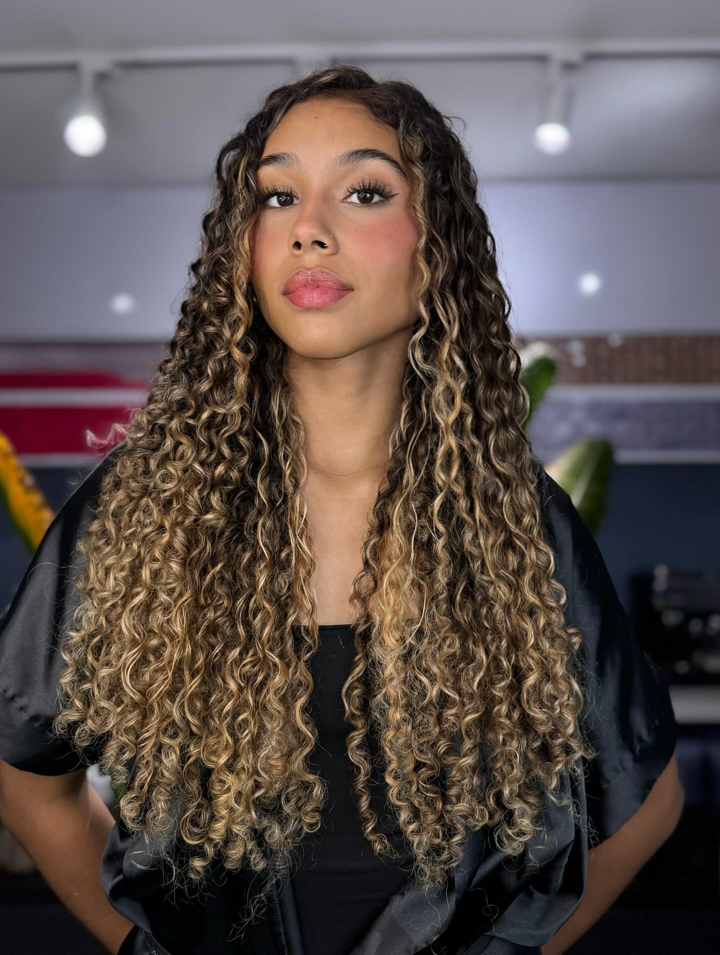 Luxurious Golden Ombre Curls with Dark Roots