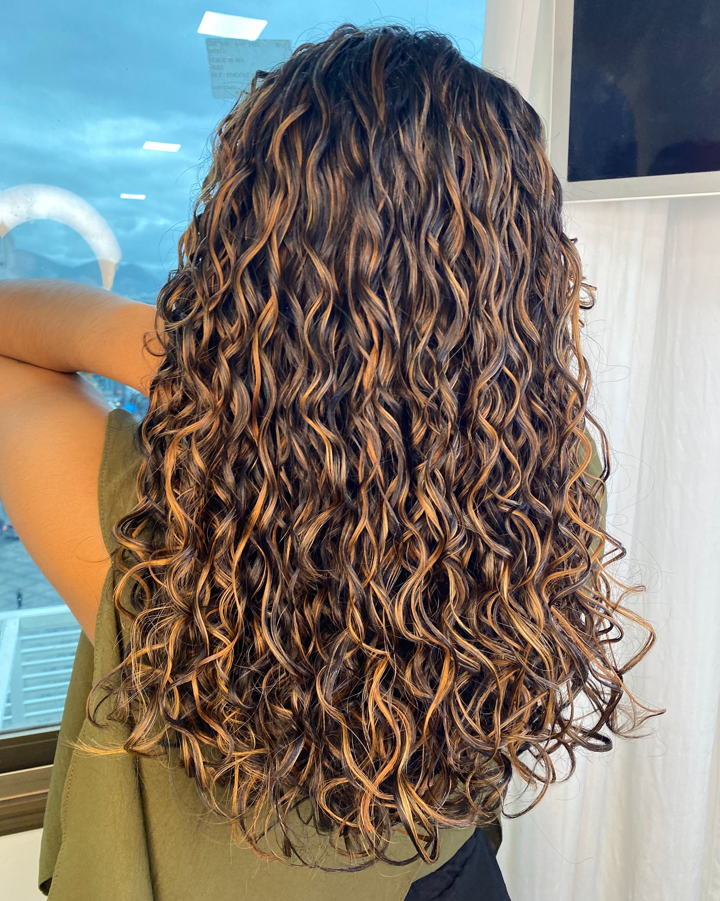 Subtle Golden Cascading Curls