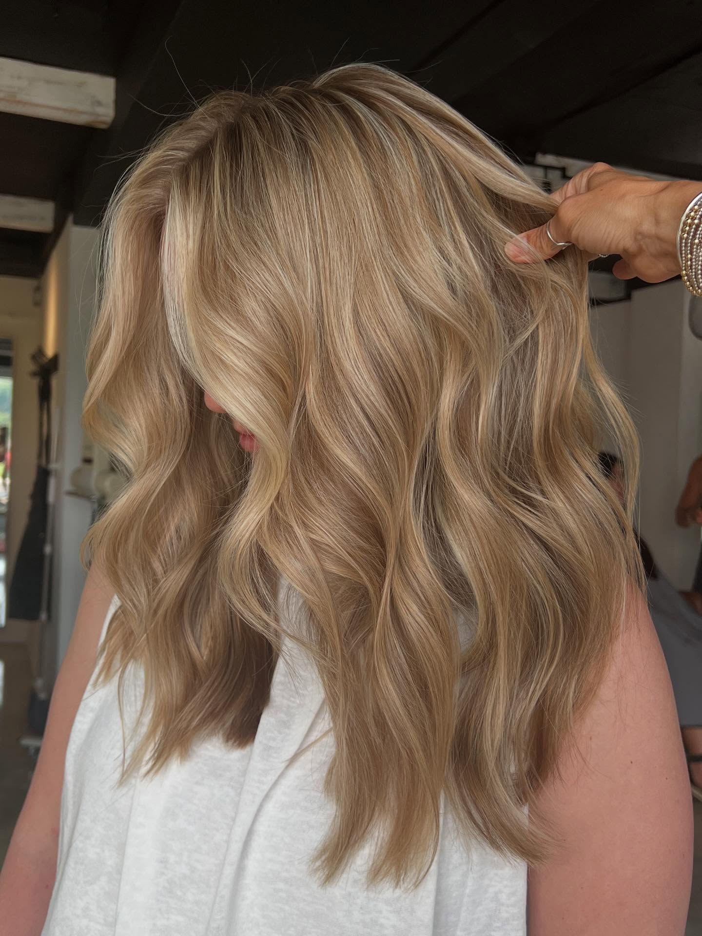 Textured Golden Blonde Waves with Luminous Finish