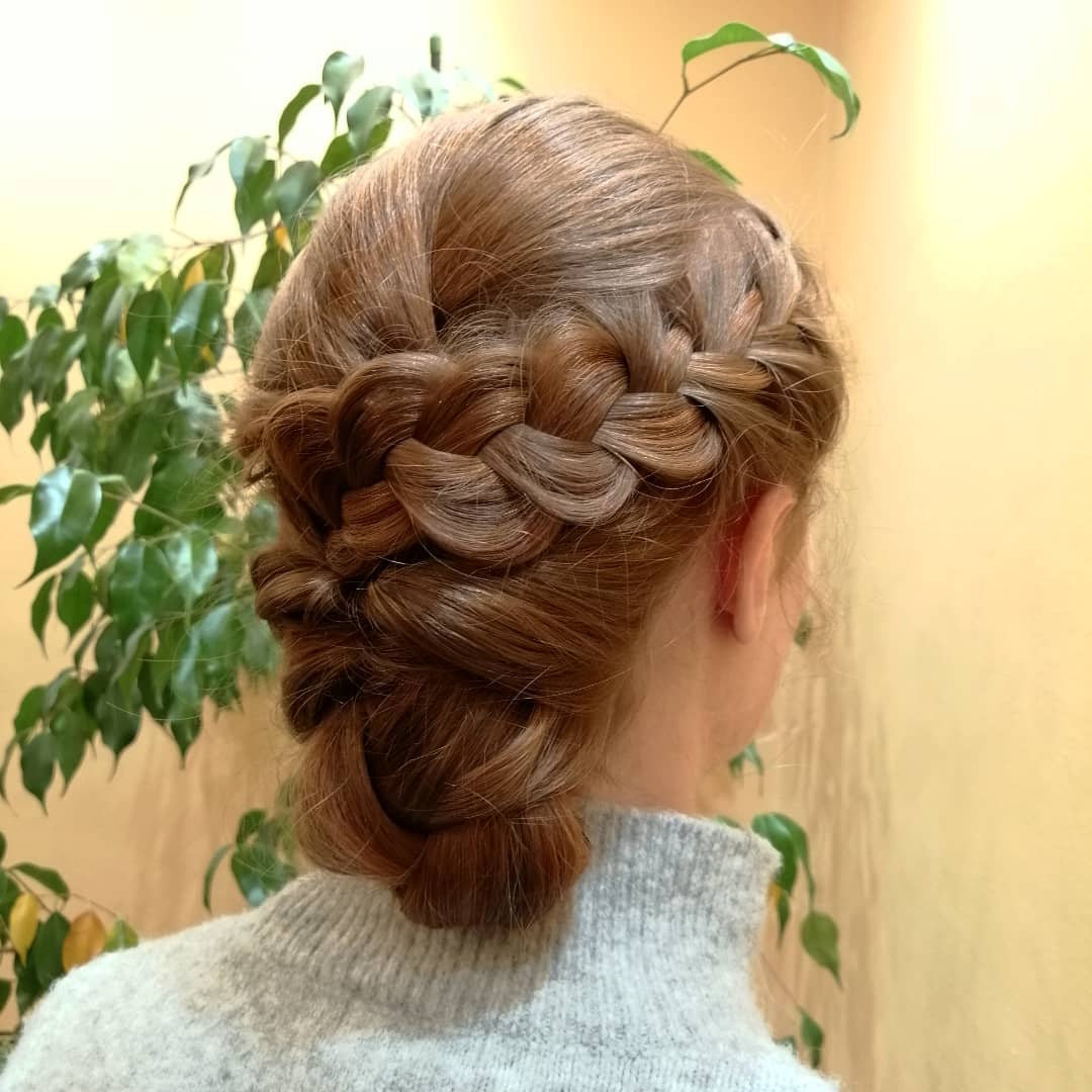 Elegant Braided Low Chignon with Intricate Detailing