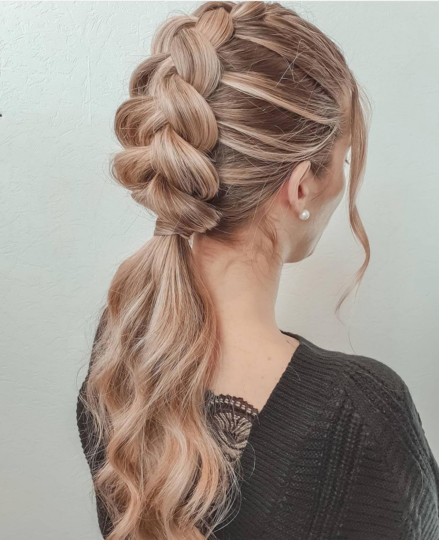 Stylish Braided Ponytail with Loose Waves