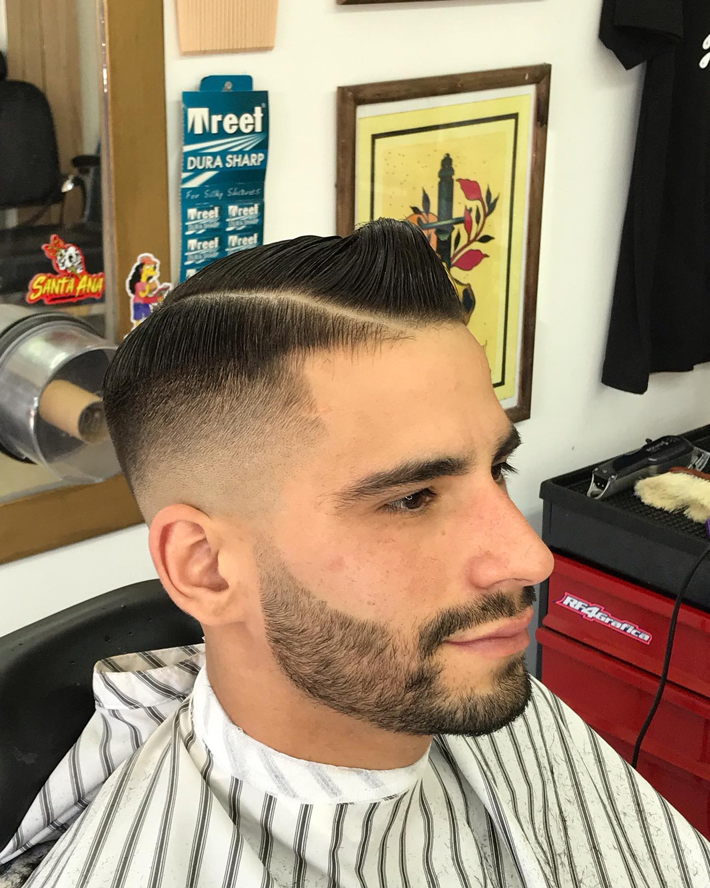 Polished Hard-Parted Pompadour with Sharp Fade