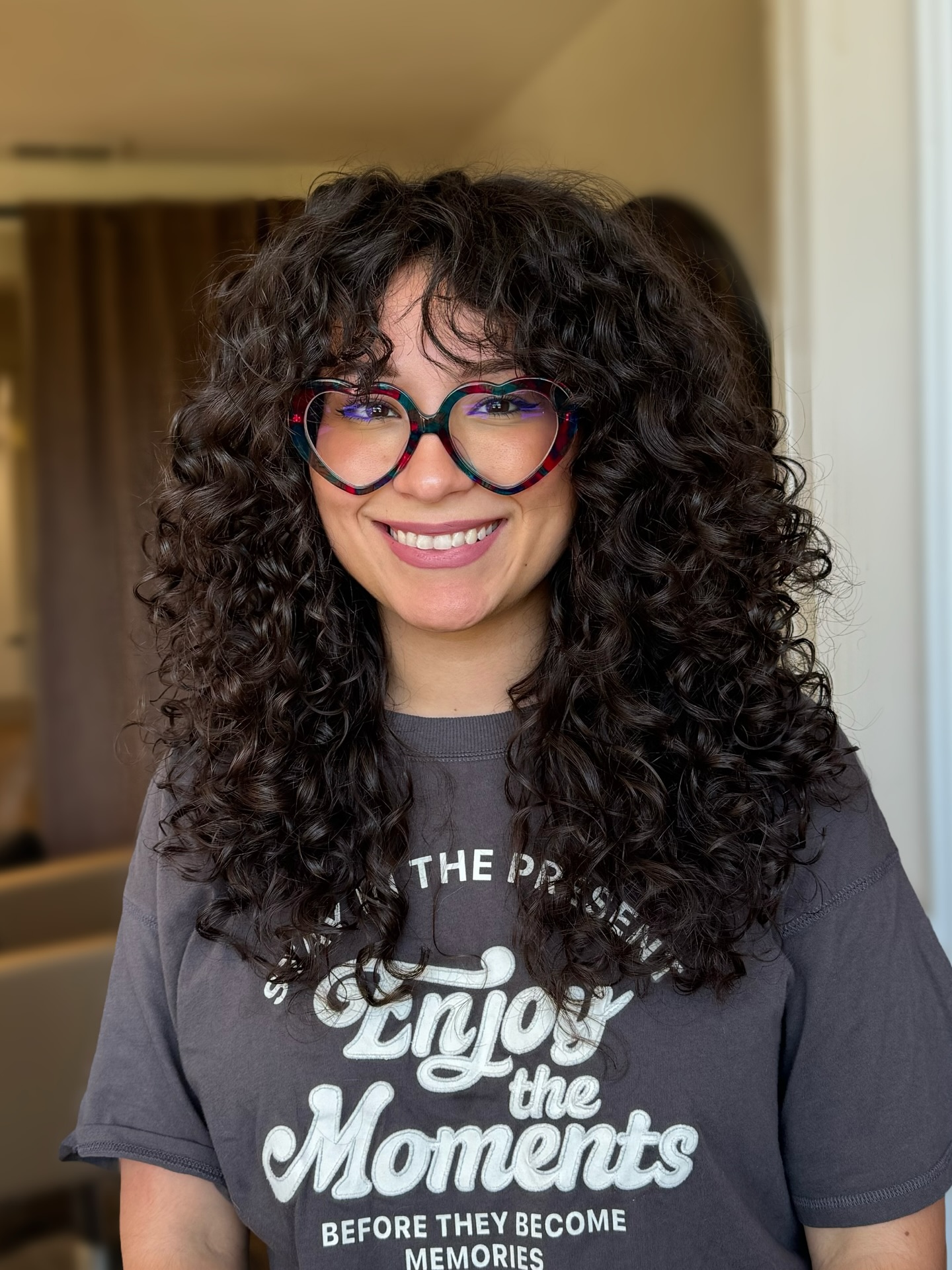 Chic Curly Face-Framing Layers