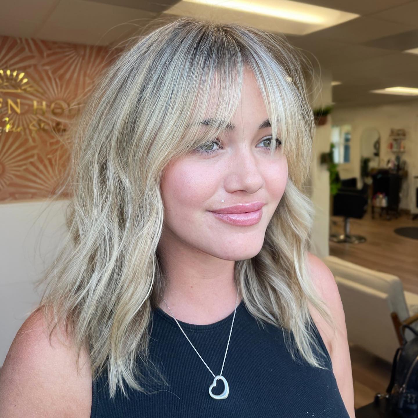 Chic Textured Lob with Face-Framing Bangs