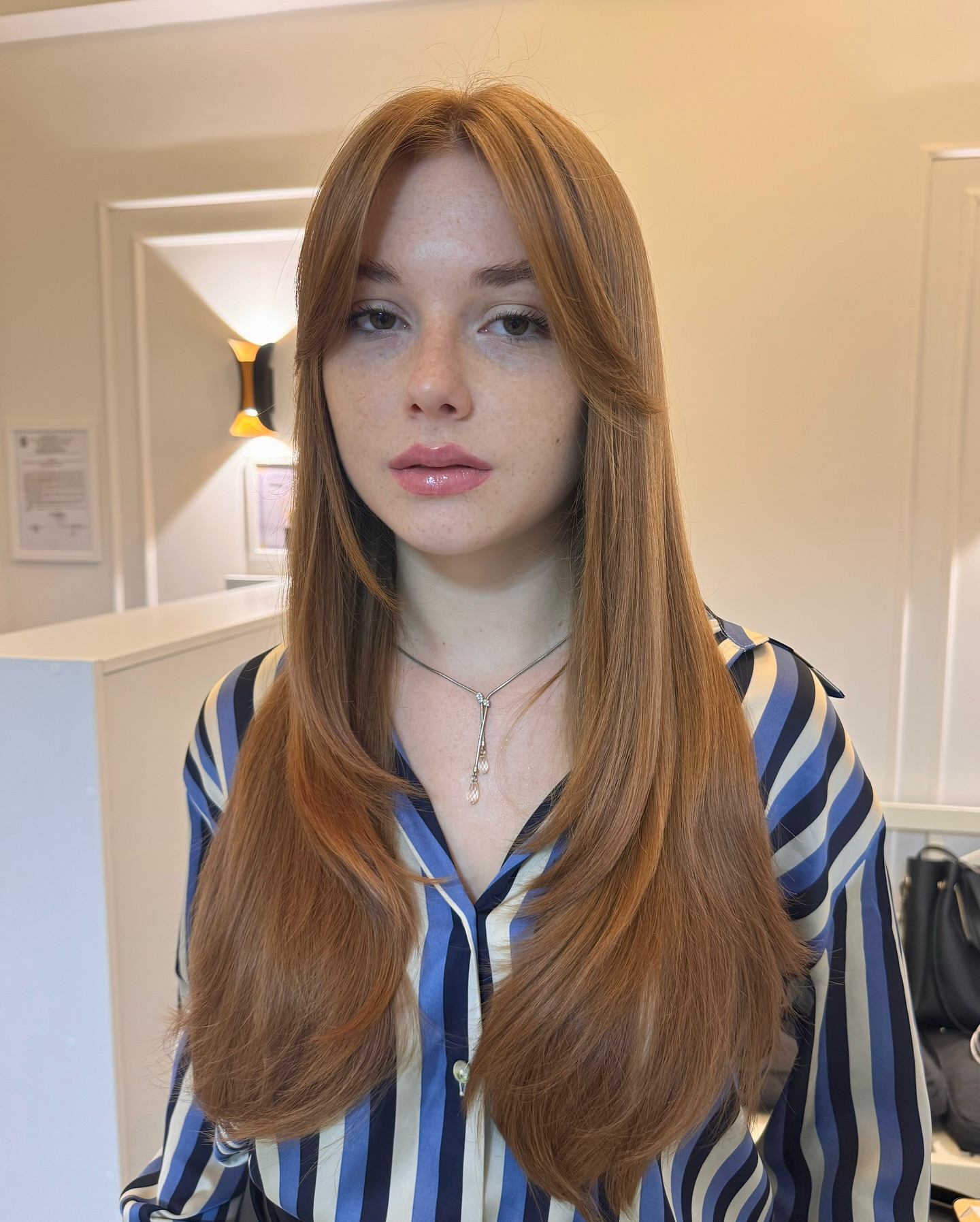 Sleek Long Hair with Face-Framing Bangs