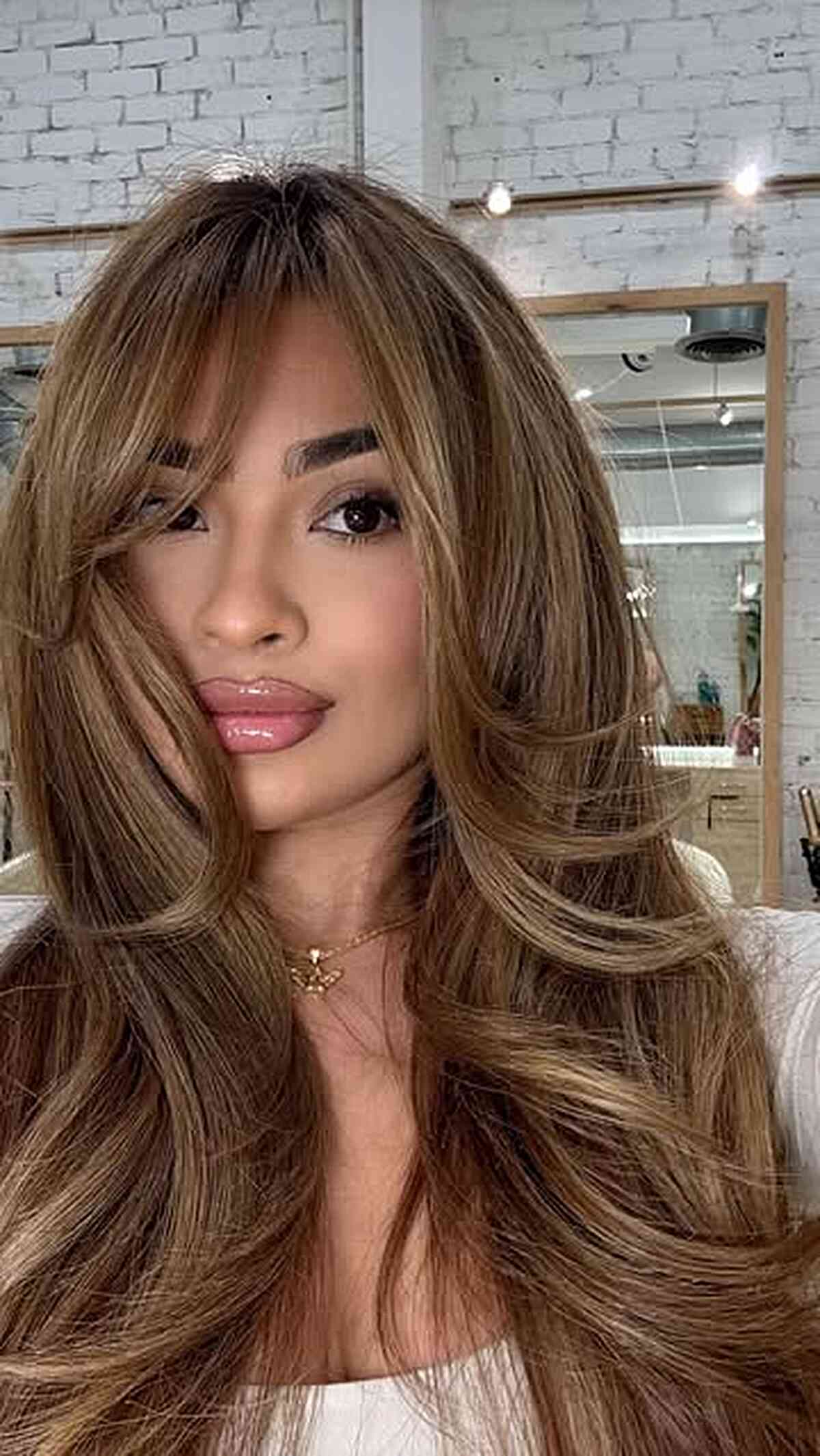 Soft Face Framing Cut with Gentle Layers