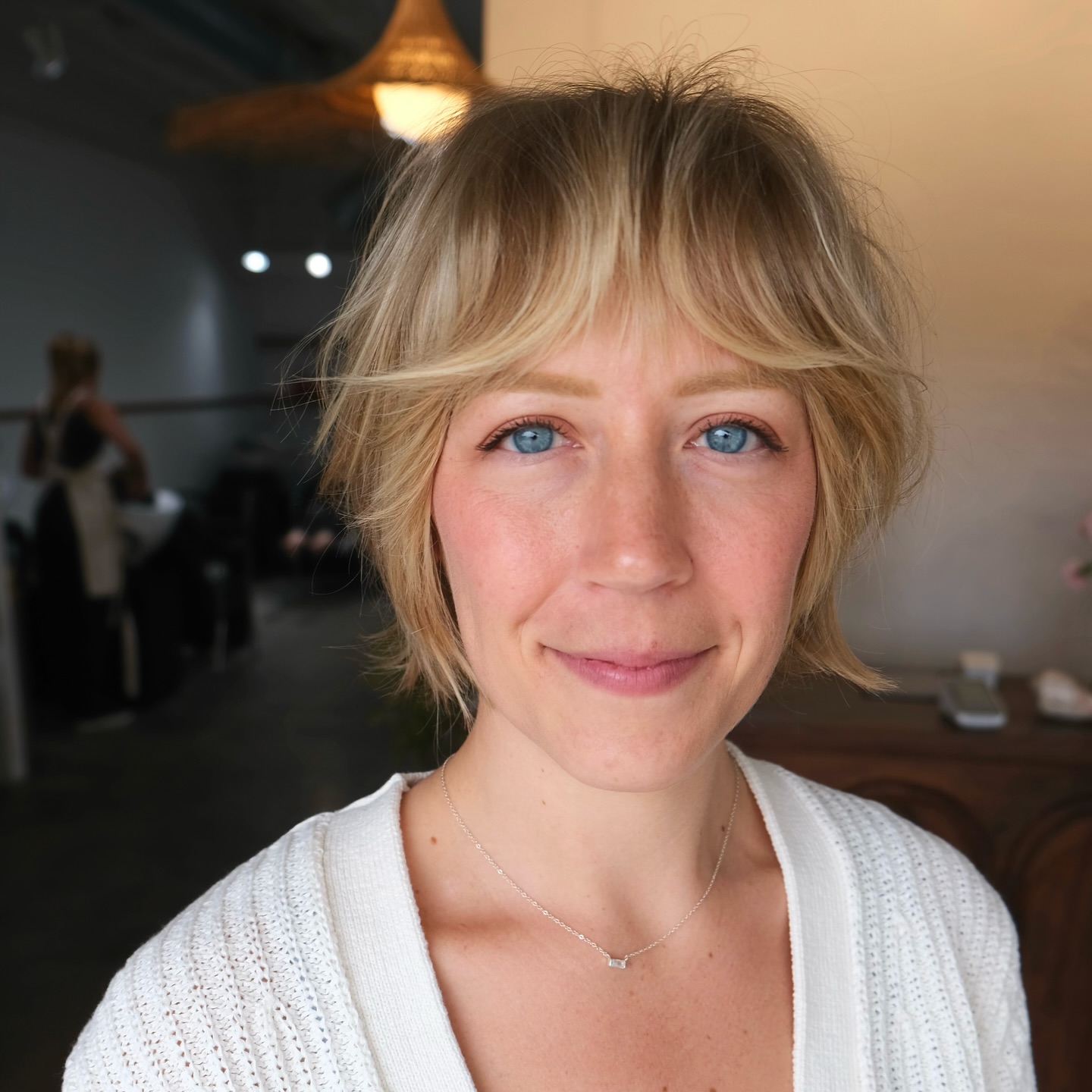 Textured Short Cut with Face-Framing Bangs