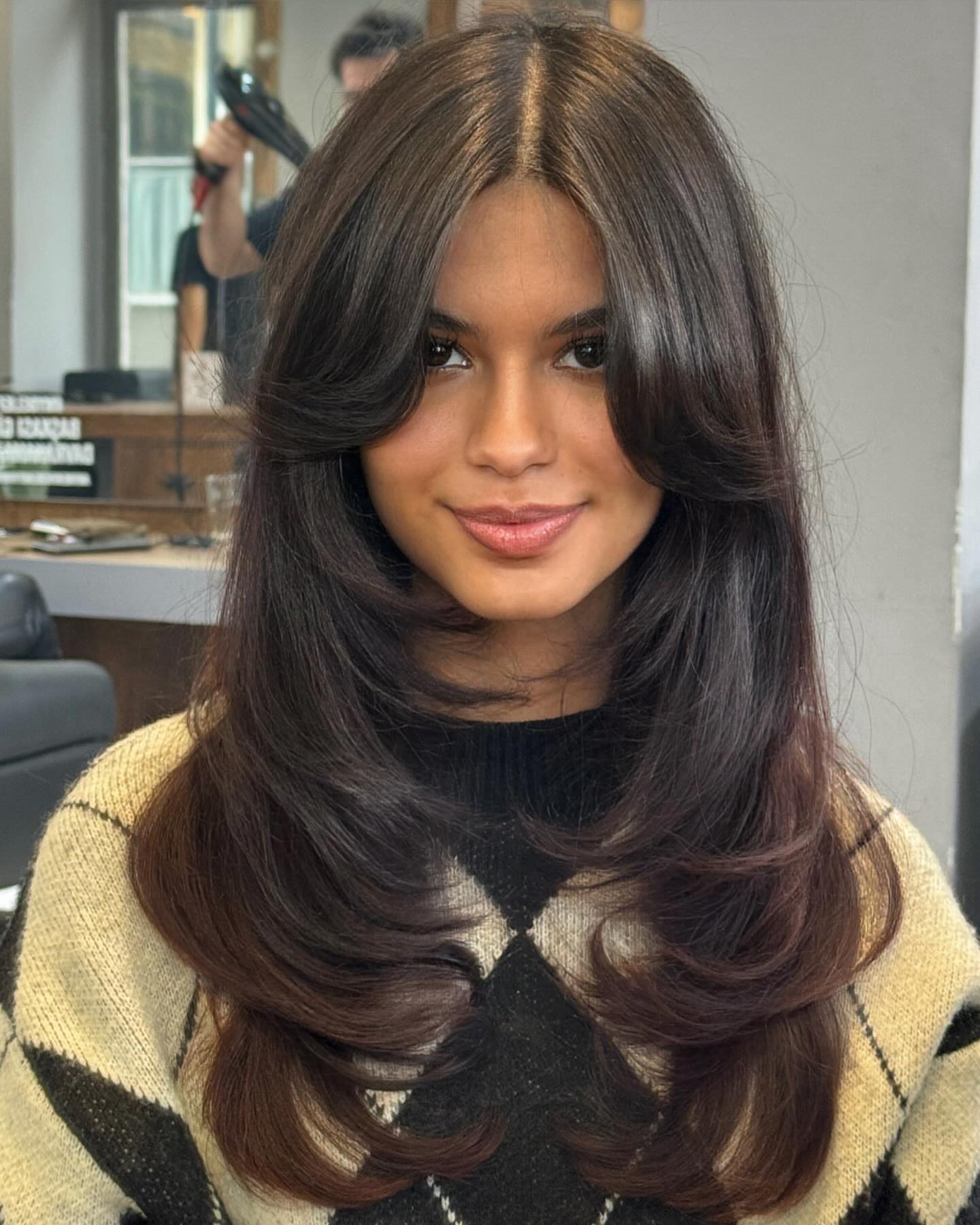 Voluminous Layered Cut with Soft Bangs