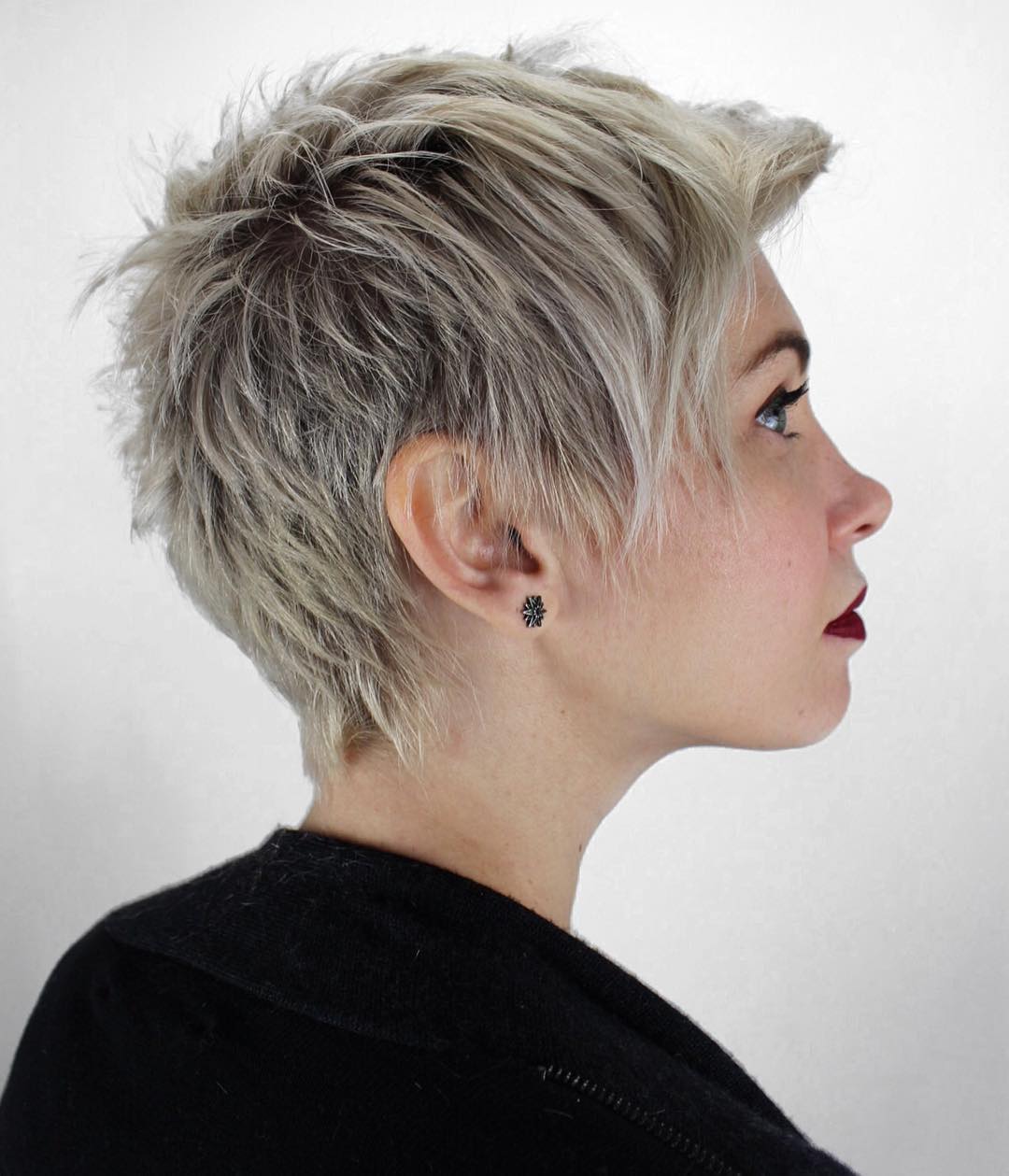 Messy Silver Blonde Shag with Tapered Nape