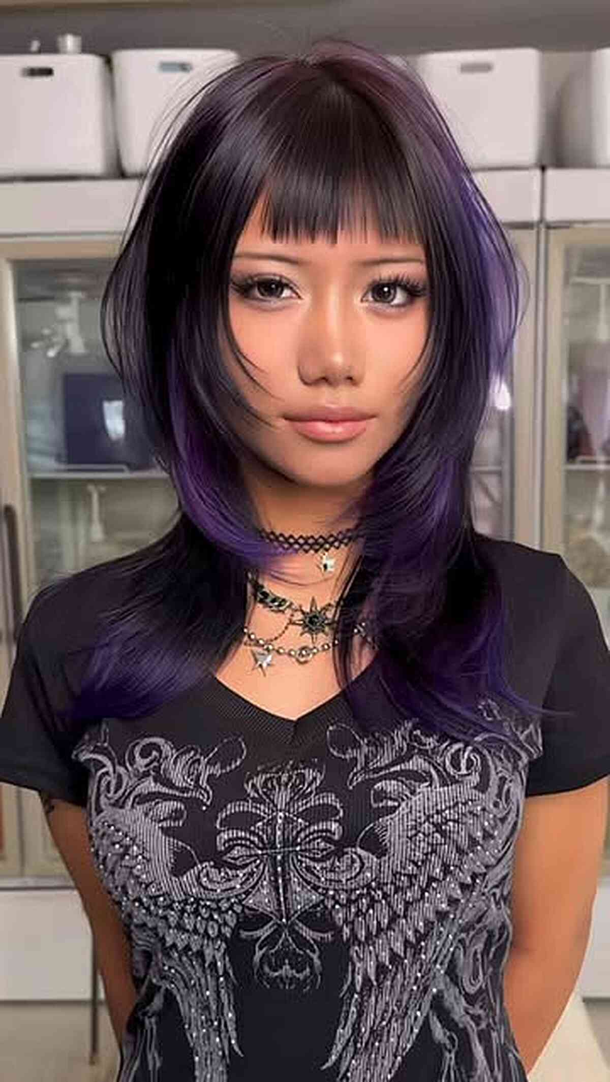 Stylish Layered Black Hair with Purple Highlights