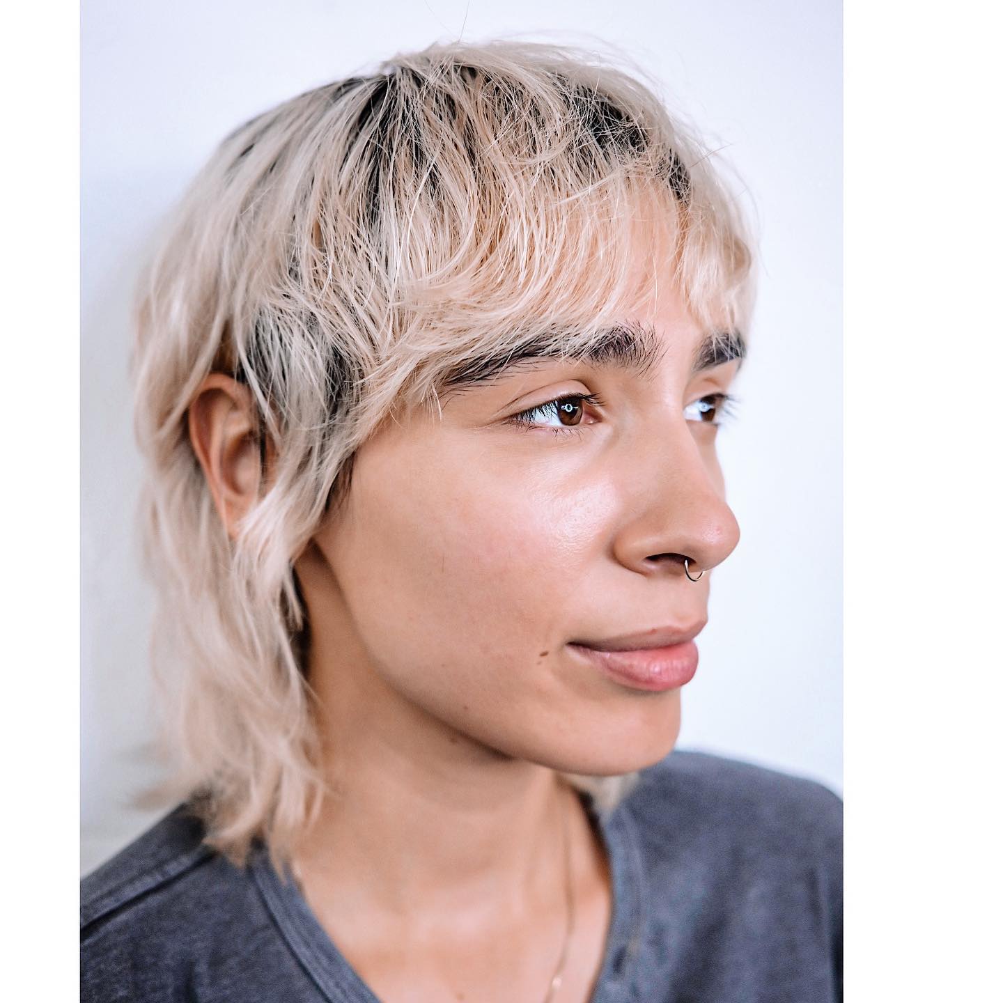 Windswept Ivory Blonde Bob with Contrasting Roots