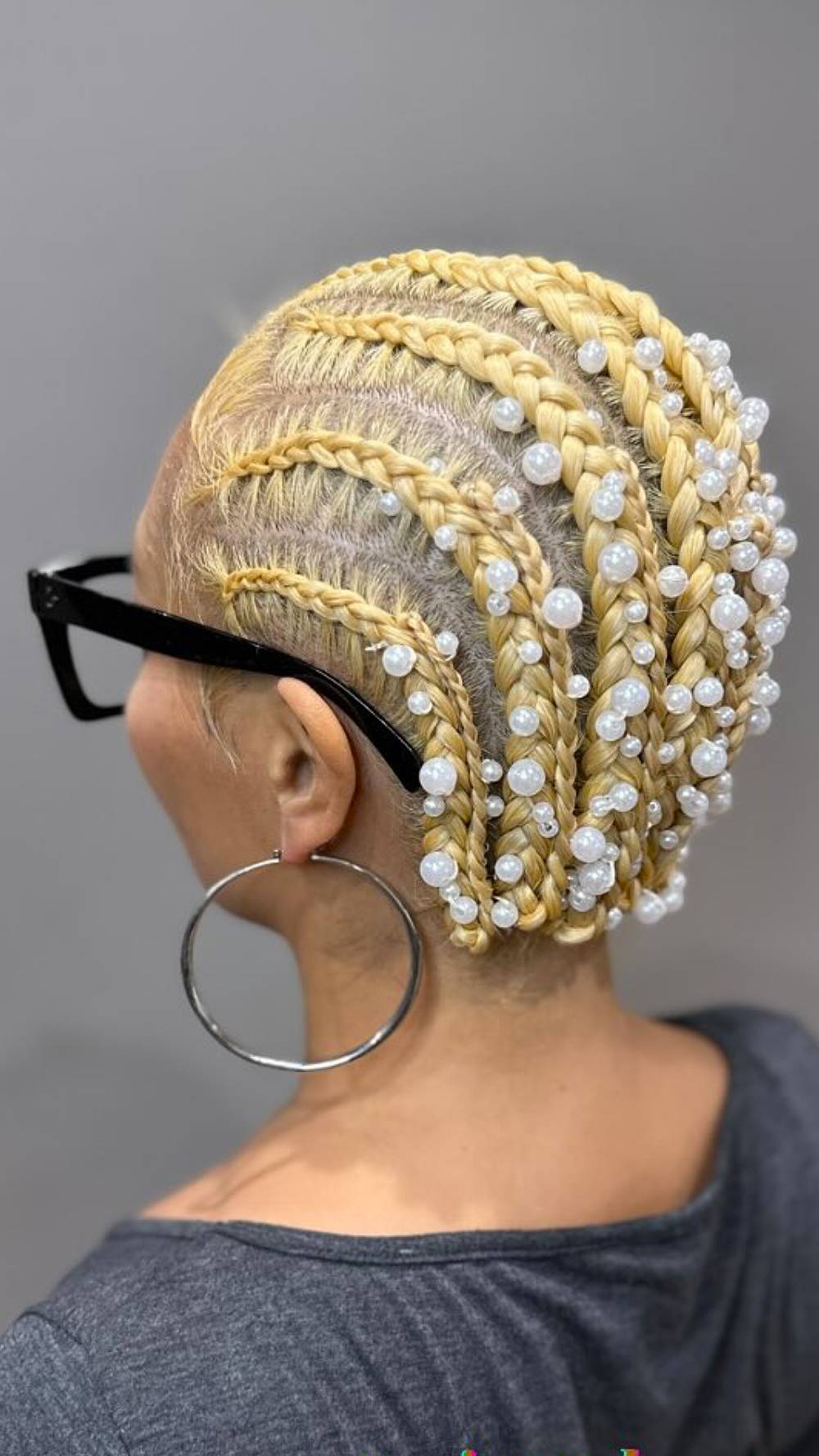 Chic Beaded Cornrow Updo with Undercut