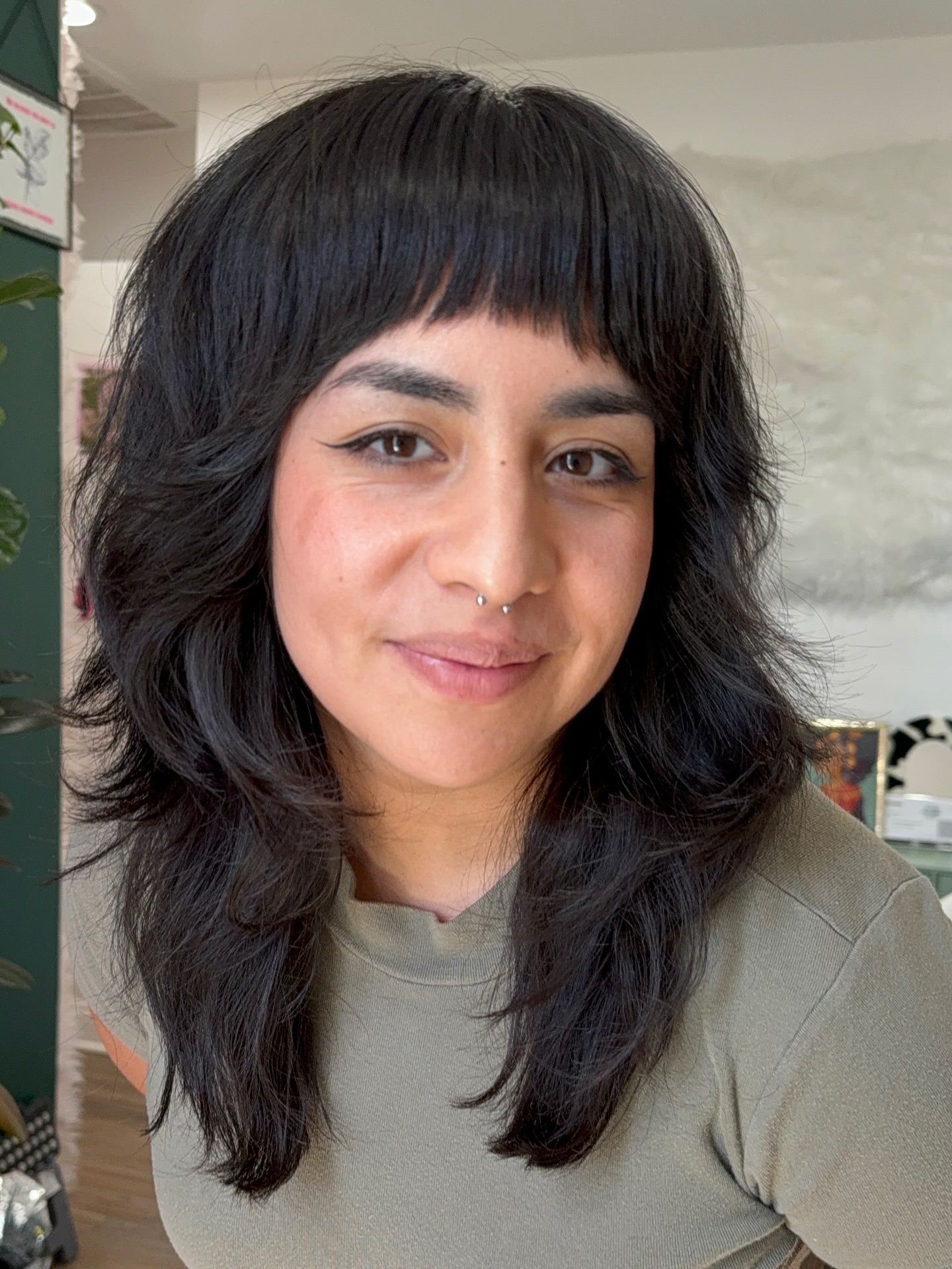 Chic Black Shoulder-Length Shag with Blunt Bangs