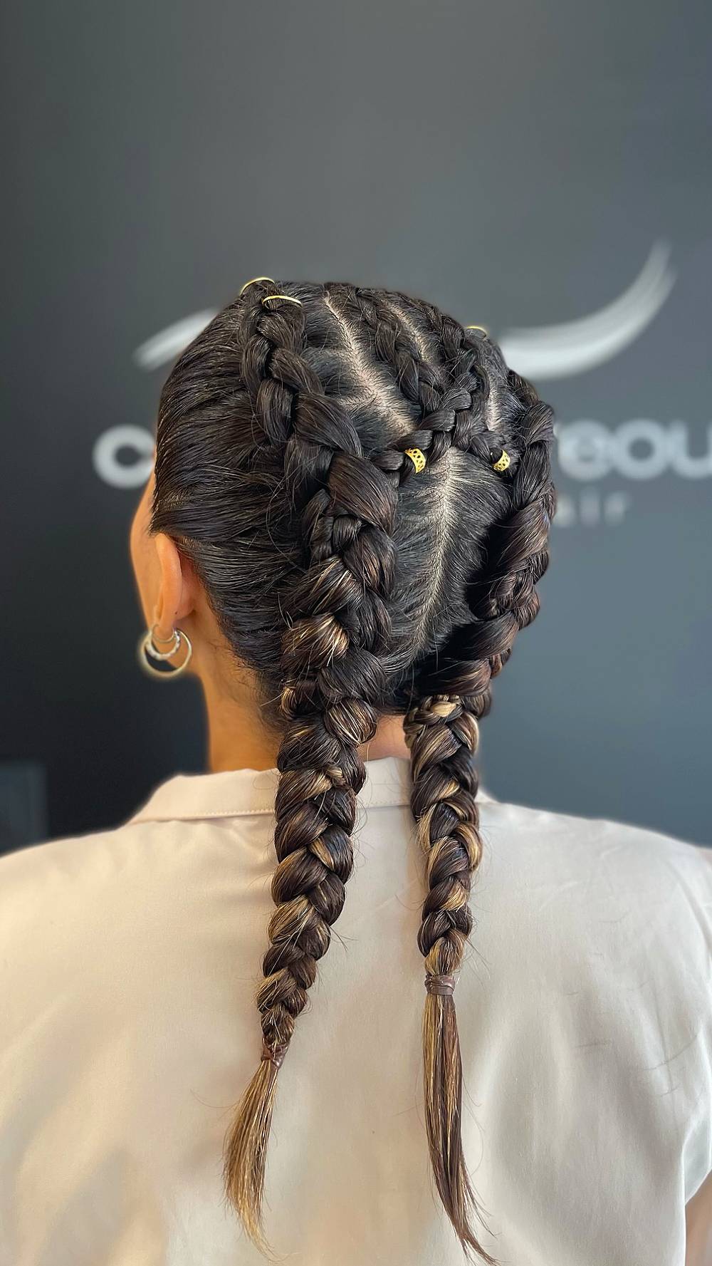 Chic Double Braided Hairstyle with Gold Accents