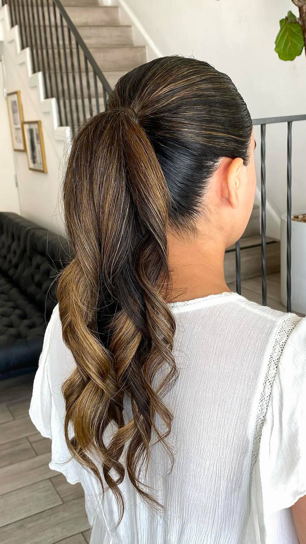 Elegant High Ponytail with Loose Waves