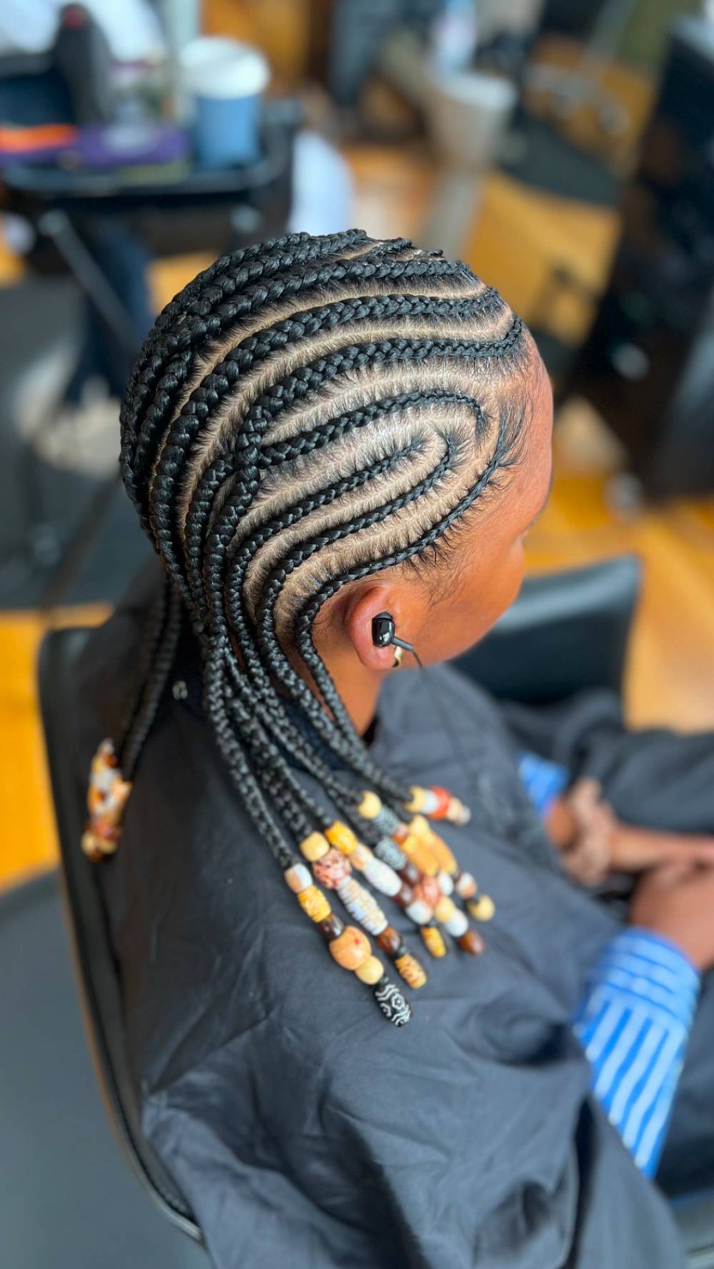 Intricate Cornrow Styles with Beaded Ends