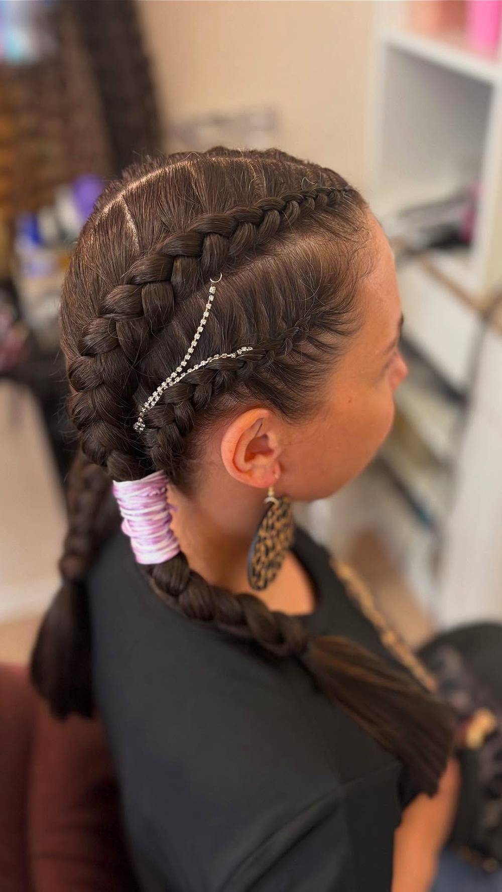 Intricate Double Braided Hairstyle with Decorative Accents