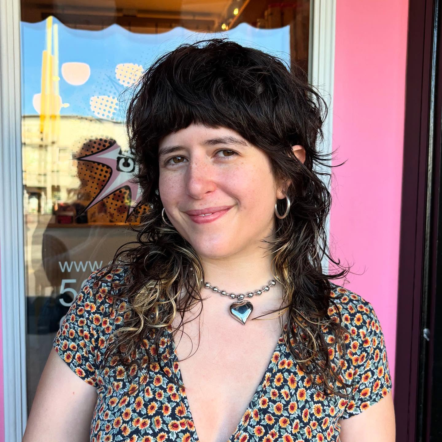 Playful Curly Shag with Blunt Bangs
