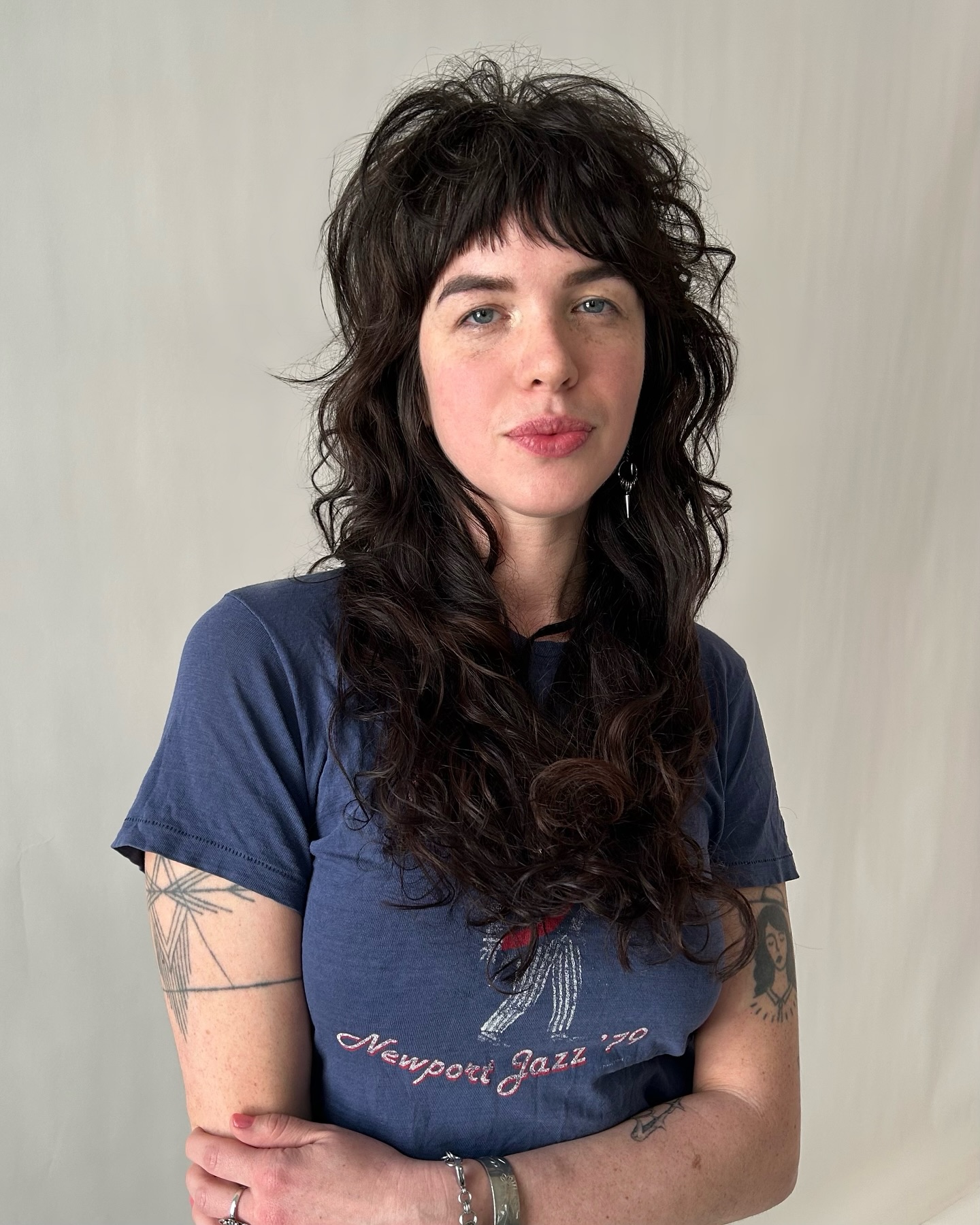 Rich Chestnut Shag with Natural Waves and Bold Bangs