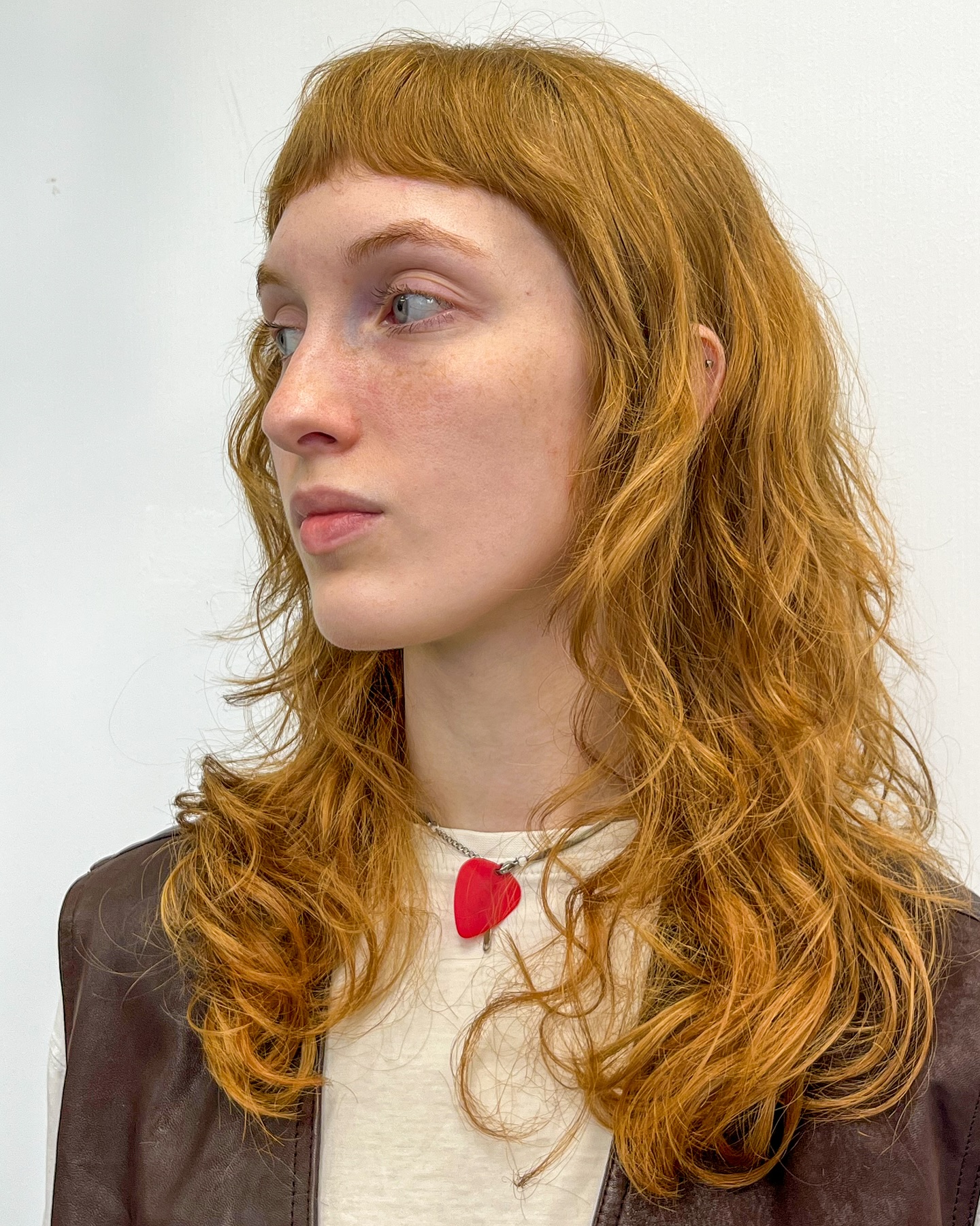 Textured Ginger Waves with Blunt Bangs
