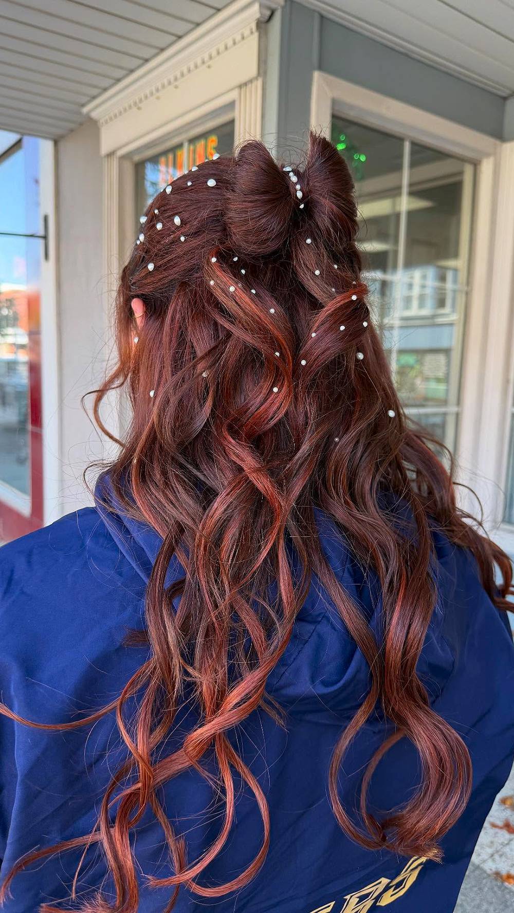 Charming Double Bun with Pearl Accents