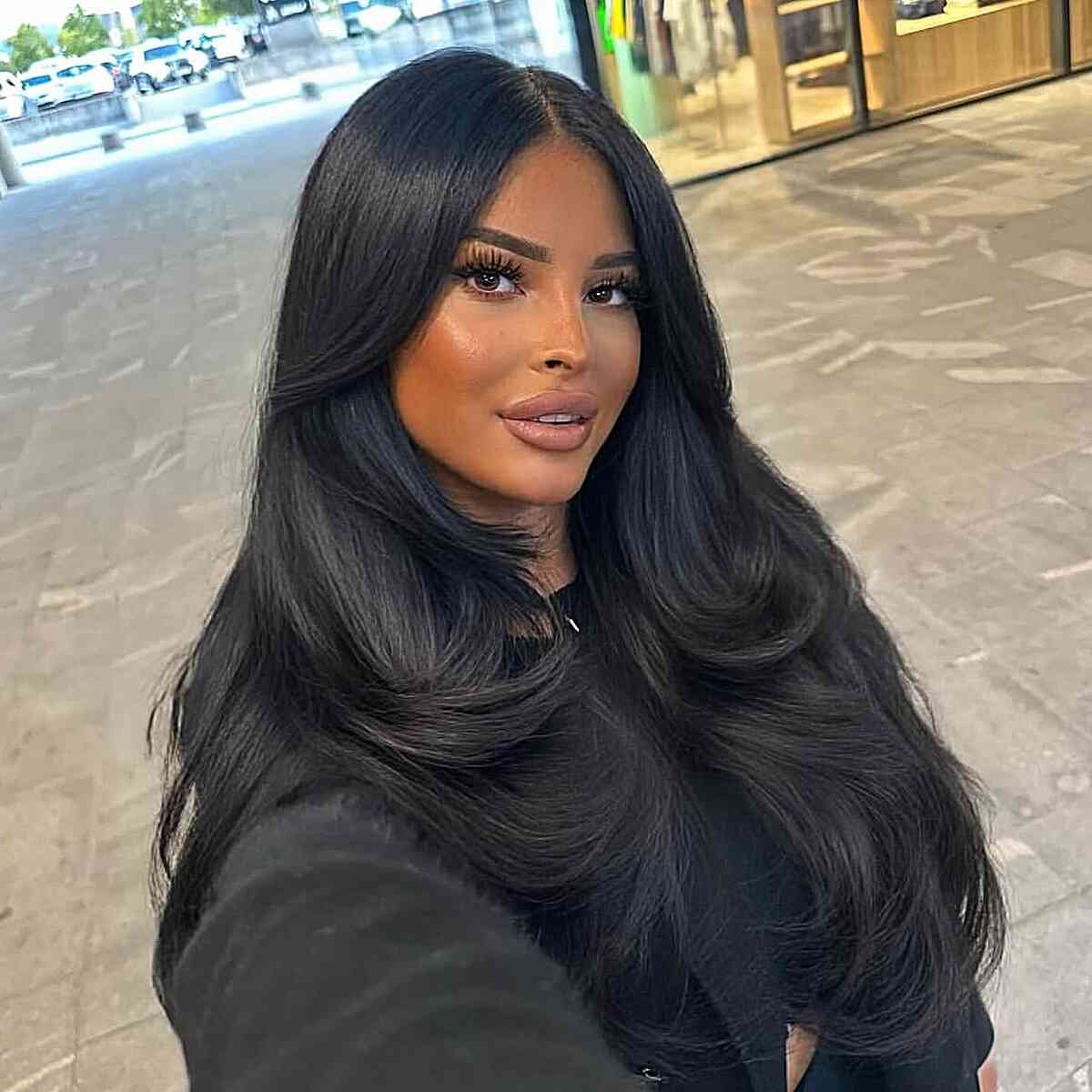 Long Jet-Black Layered Hair with Volume