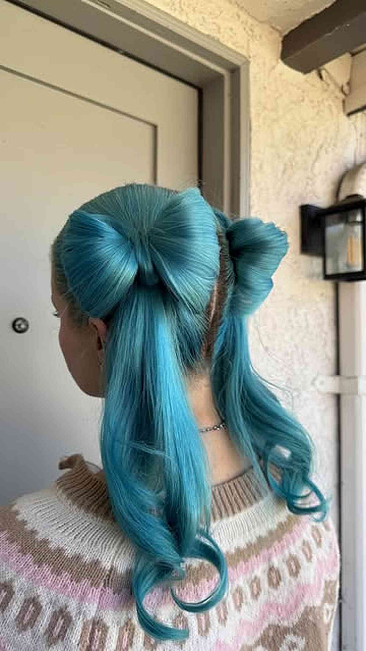 Aqua Blue Bow Hairstyle with Loose Curls