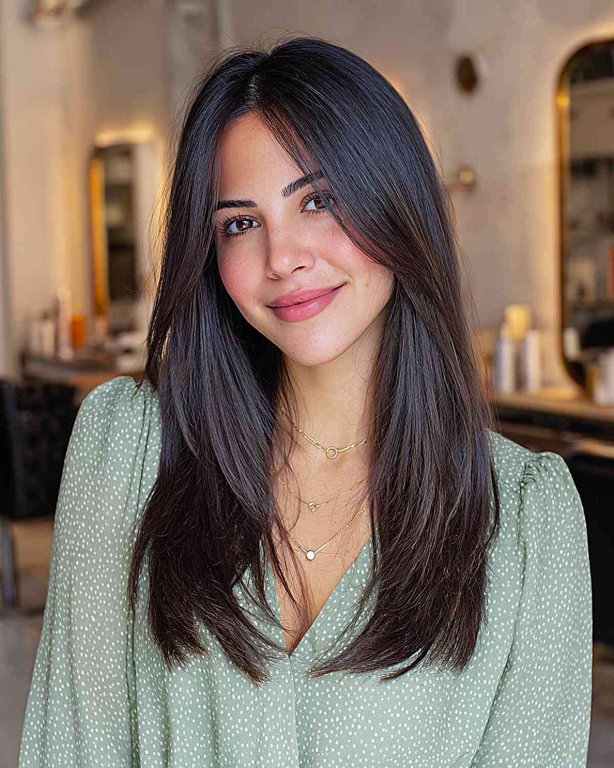 Sleek Long Layered Cut with Subtle Face-Framing Layers
