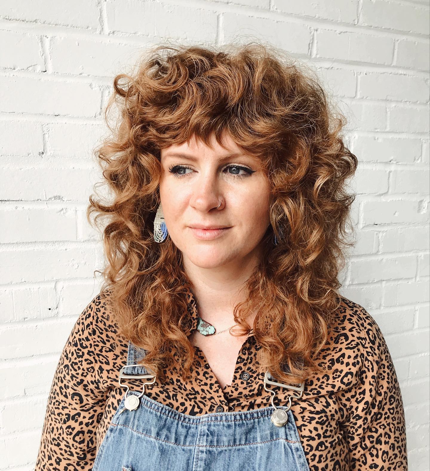 Chic Auburn Spiral Layers with Soft Fringe