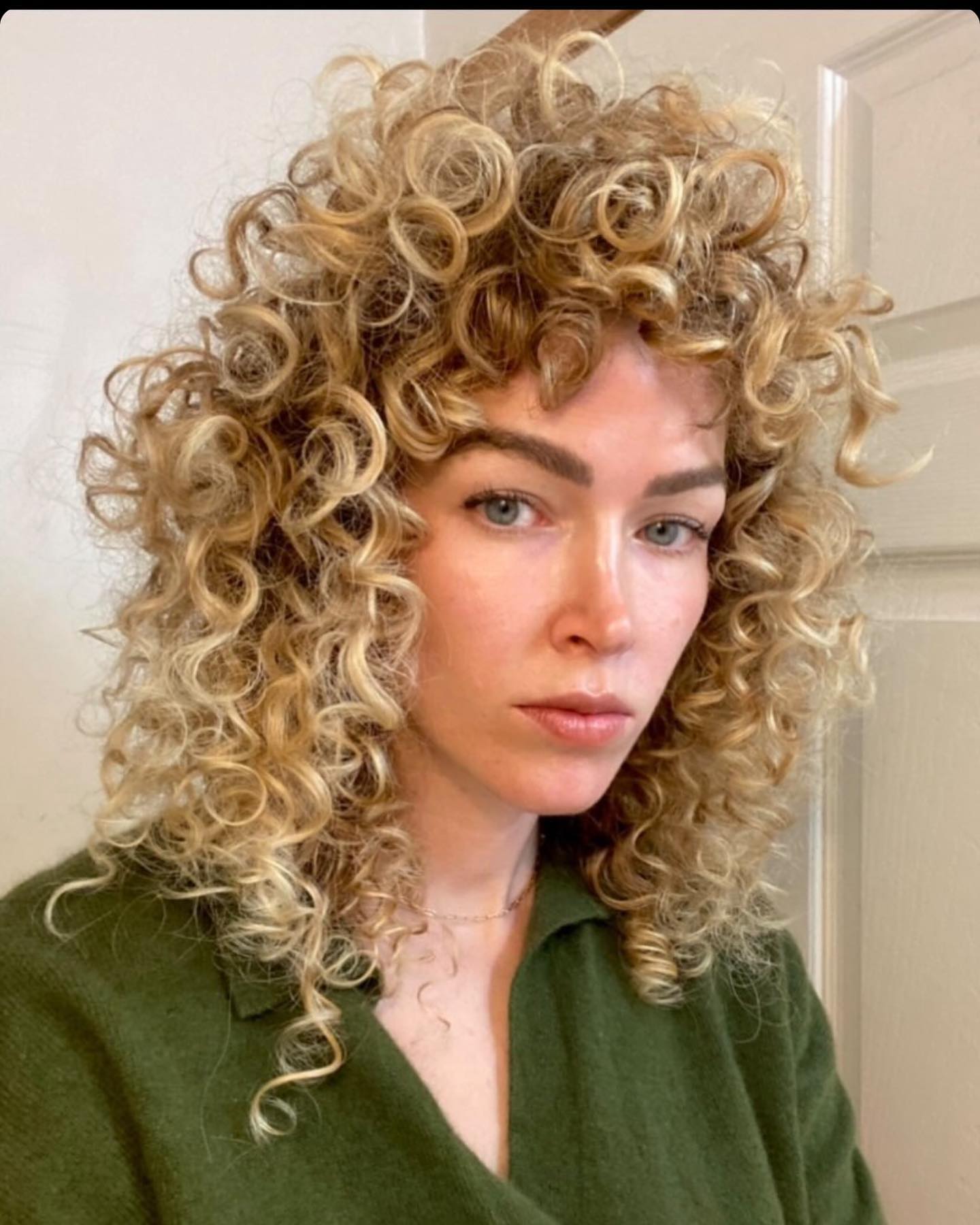 Sun-Kissed Blonde Voluminous Wolf Curls